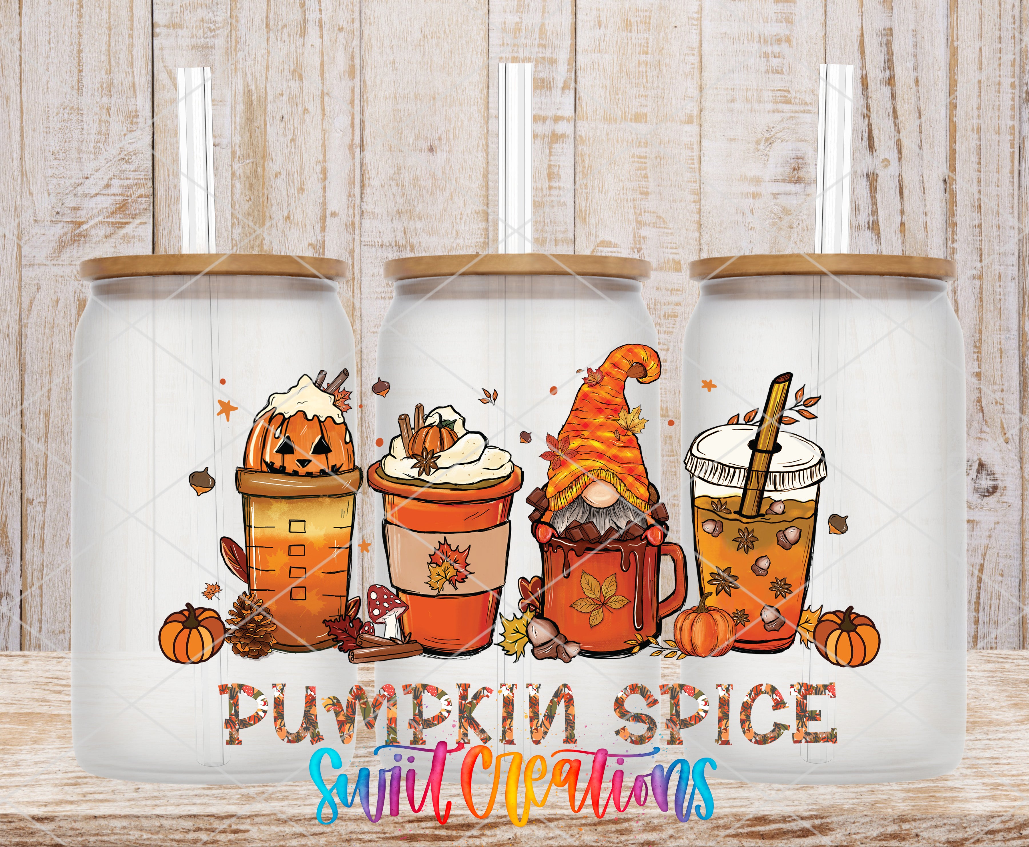 three glass jars with illustrations of pumpkin spice drinks and a gnome, arranged in a row on a wooden surface.