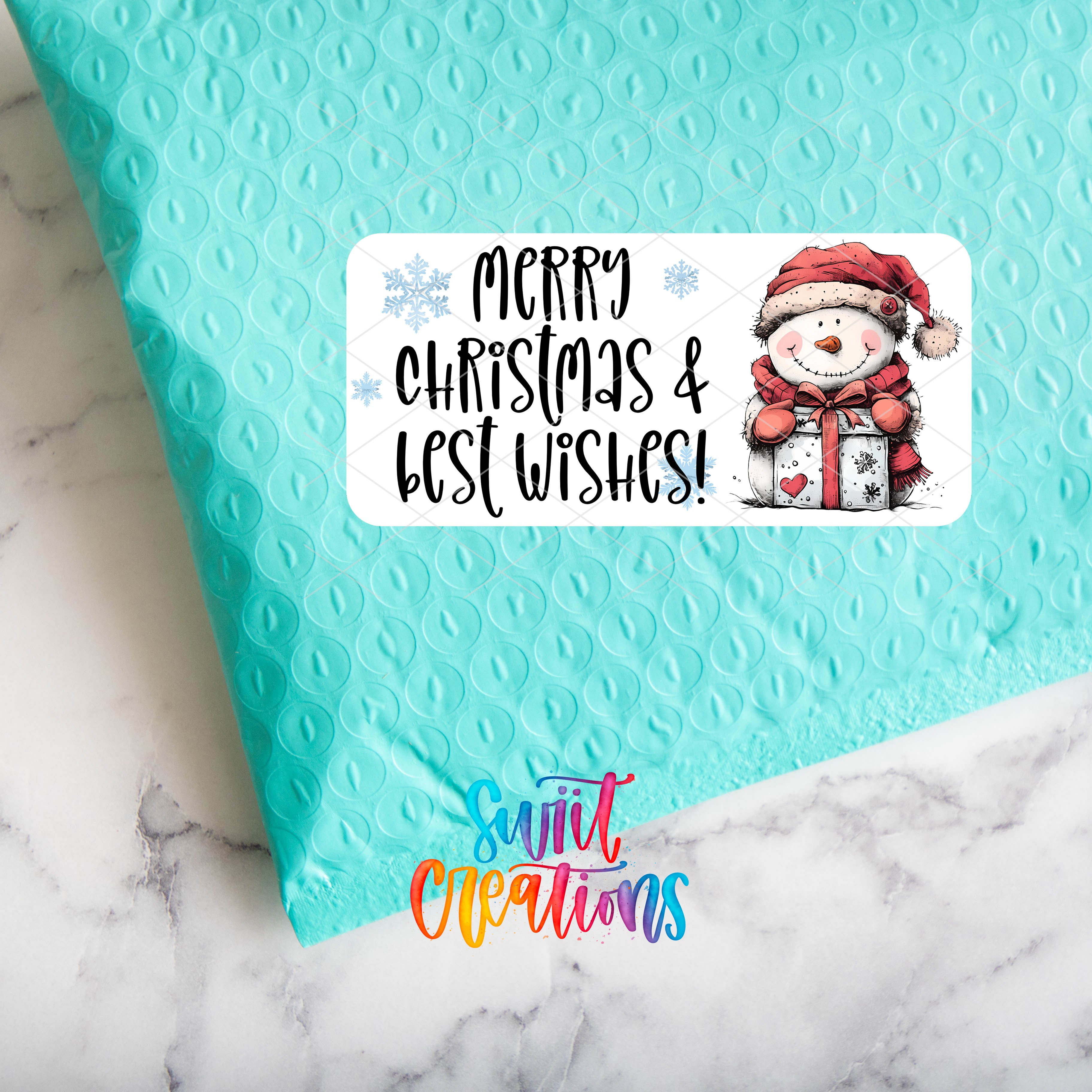 a blue envelope with a snowman on it