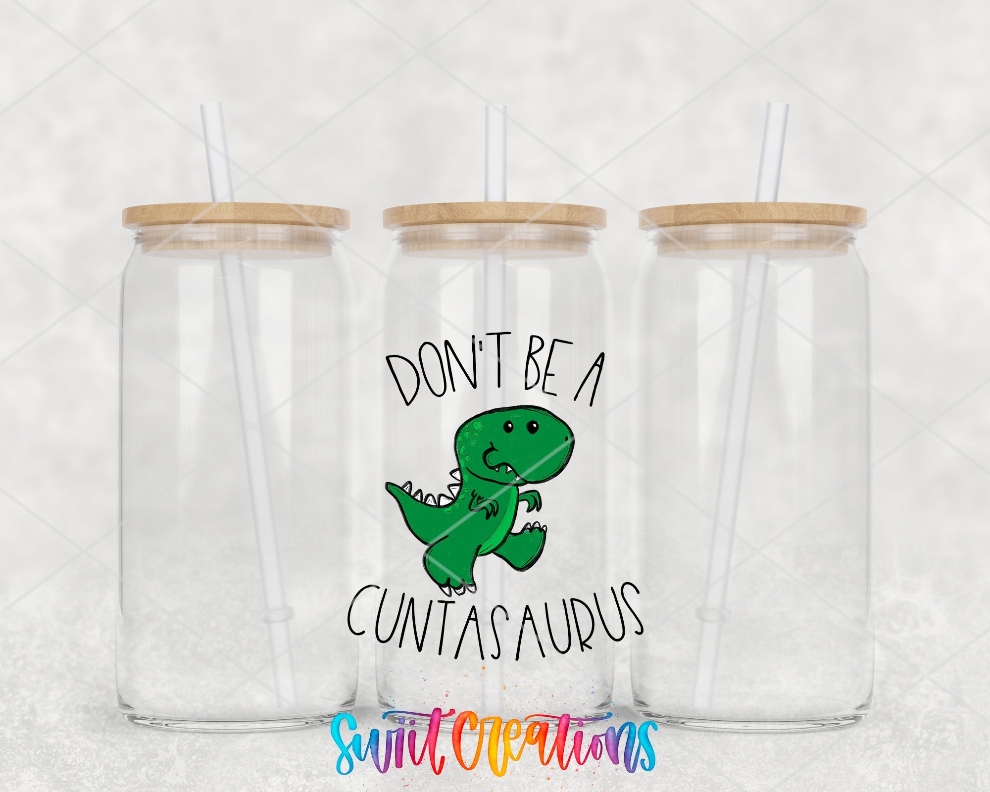 two clear tumblers with the words don't be a dinosaur printed on them
