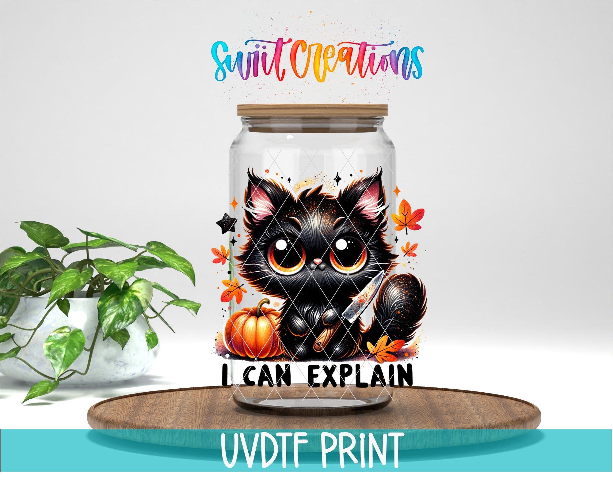 a glass jar with a picture of a black cat on it
