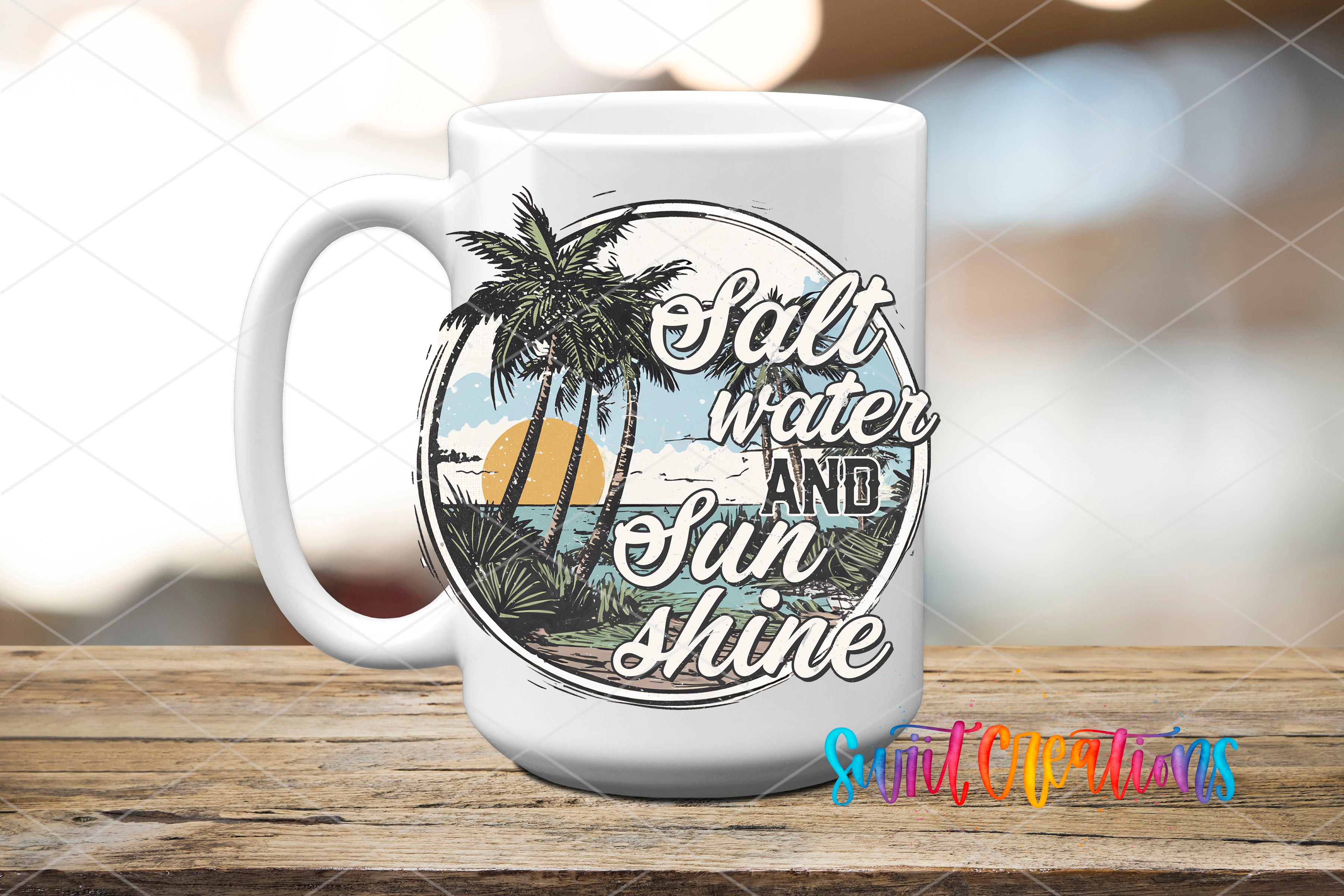 A white mug with a graphic design featuring palm trees, a sunset, and the text "Salt water and shine" on it, placed on a wooden surface.