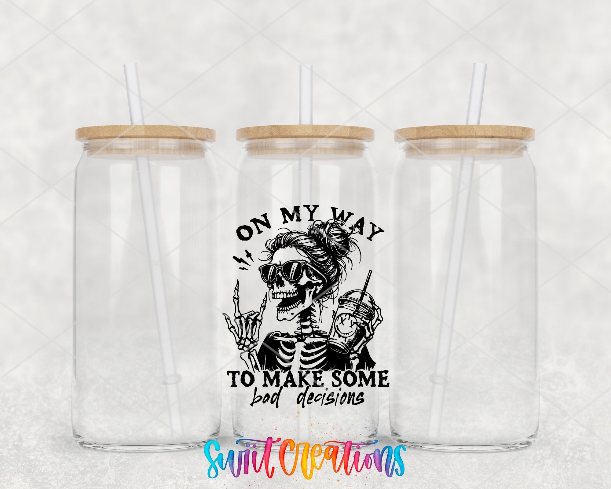 two clear tumblers with a skeleton on them