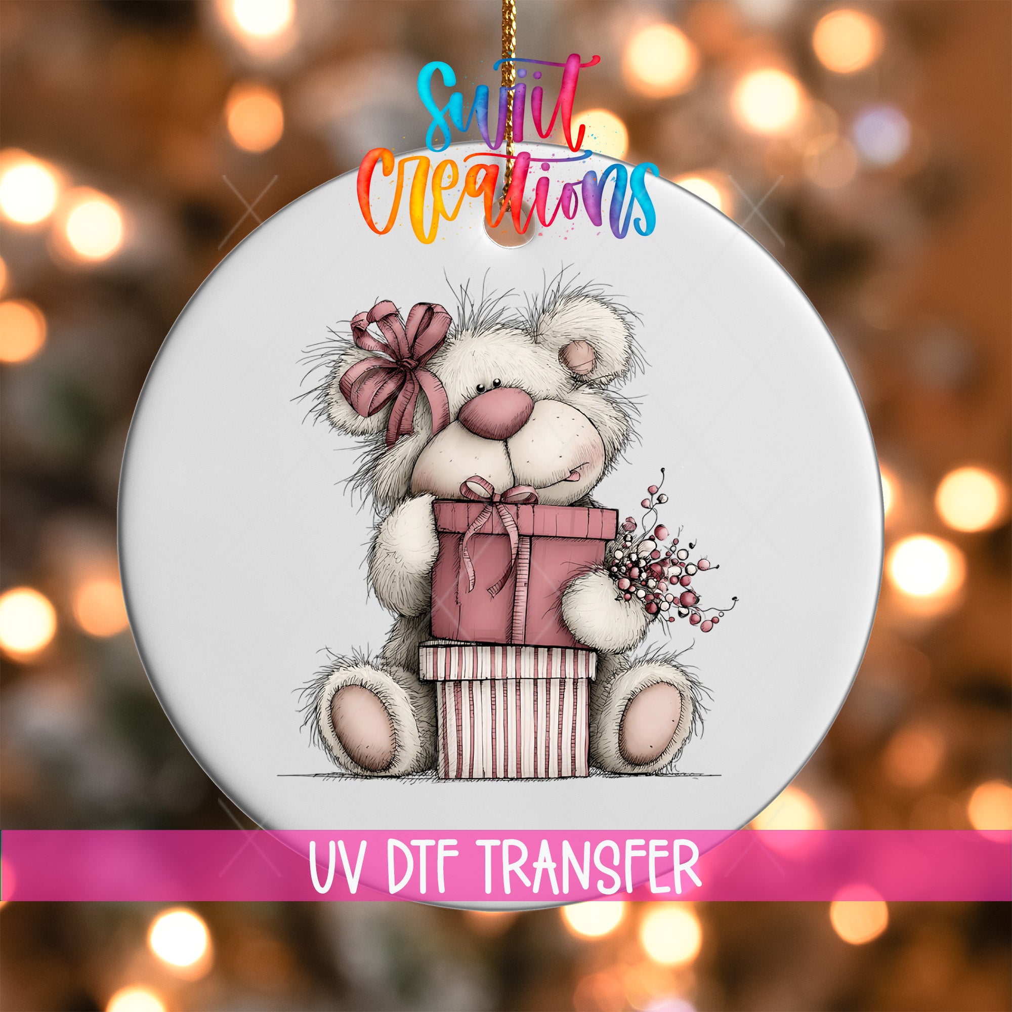 A white ornament with a teddy bear holding a gift box and flowers, set against a background of colorful lights.