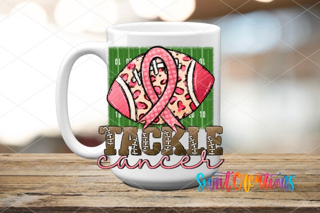a coffee mug with a pink ribbon on it
