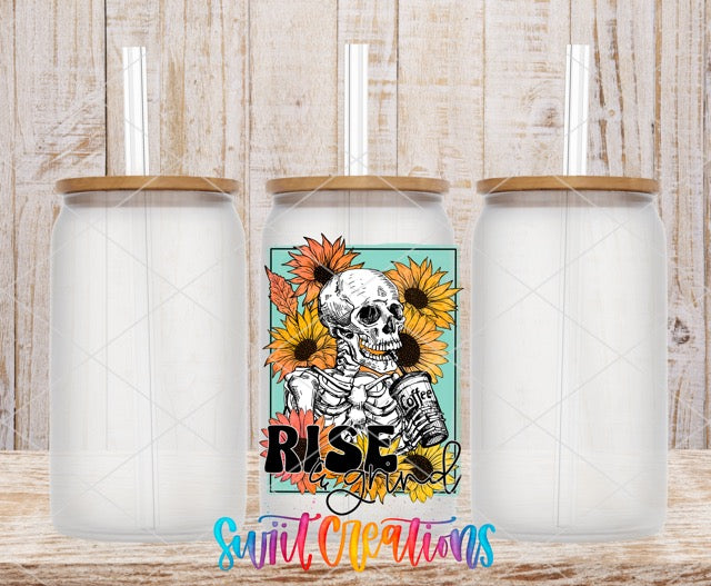 two white tumbles with a skeleton and sunflowers on them
