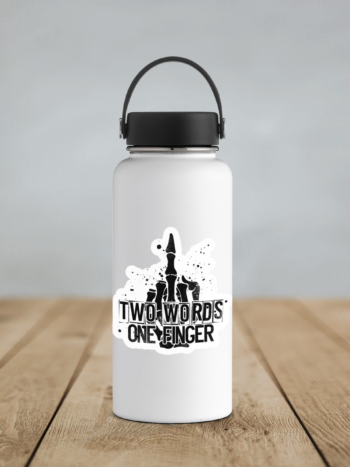 Two Words One Finger sticker on a white insulated water bottle