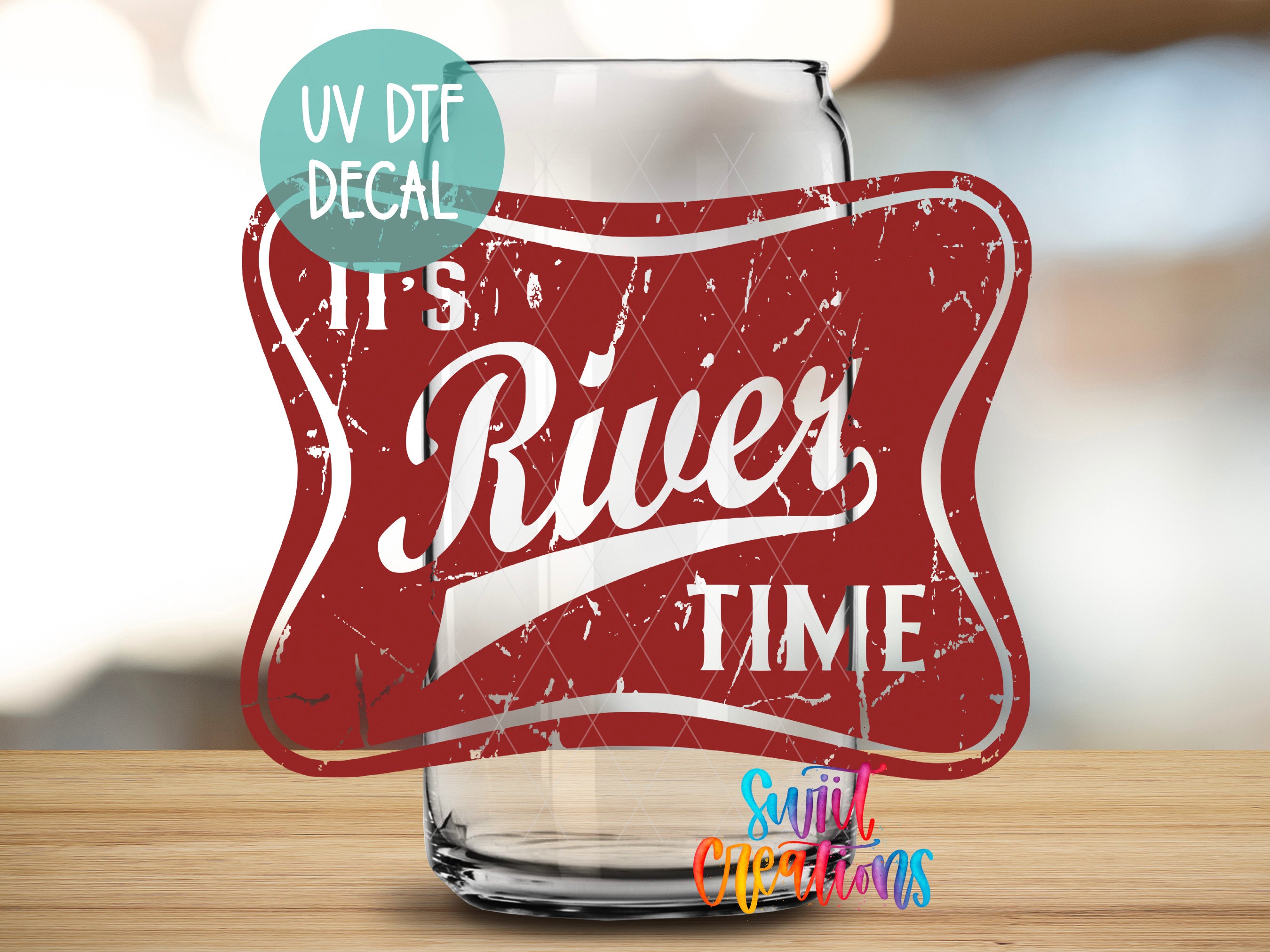 a beer glass with a red label on it