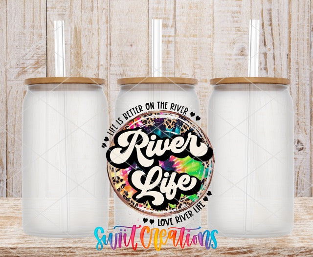two white tumblers sitting on top of a wooden table