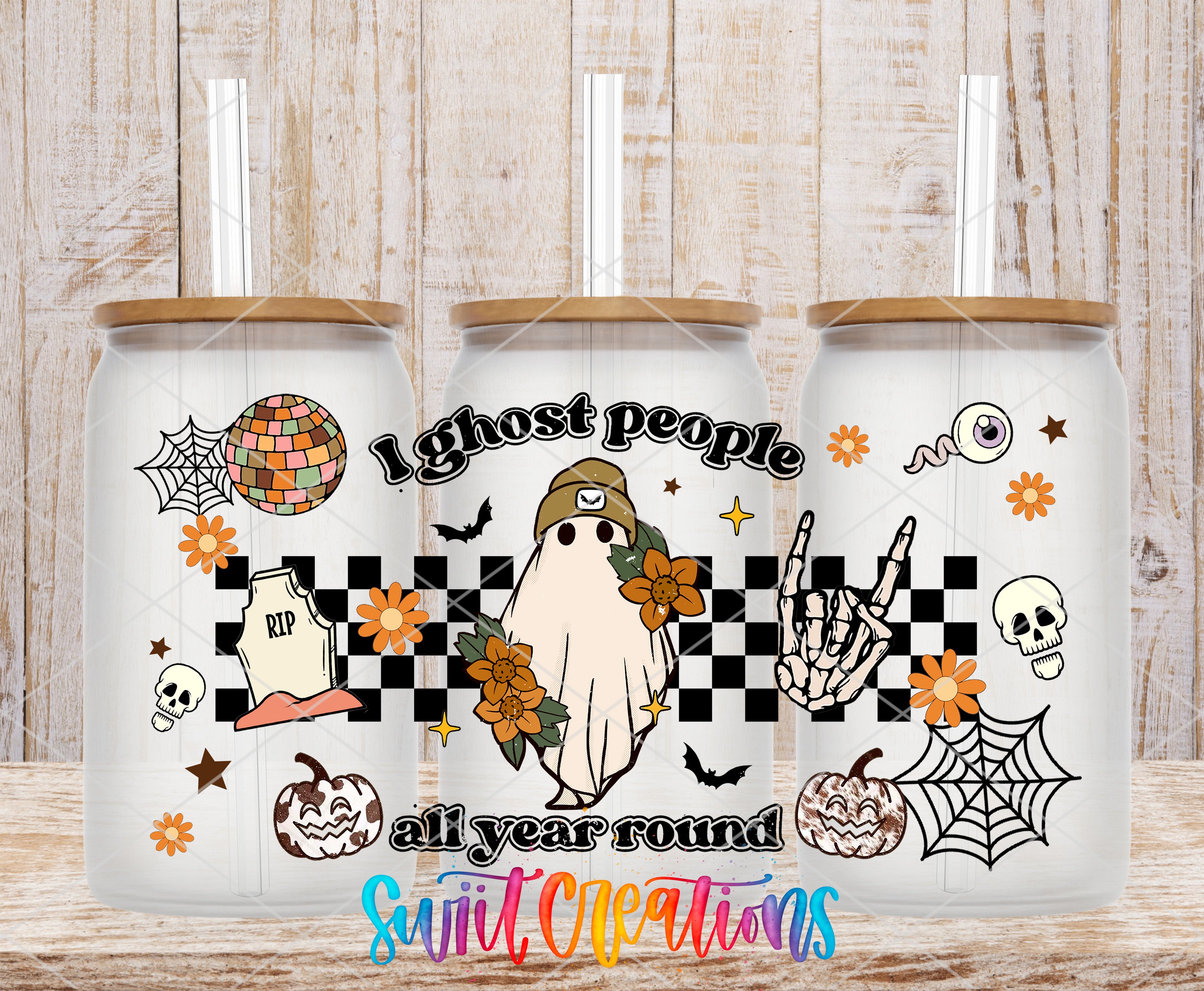 A triptych of white tumblers with Halloween-themed designs, including a ghost, spider, skull, pumpkin, and flowers.