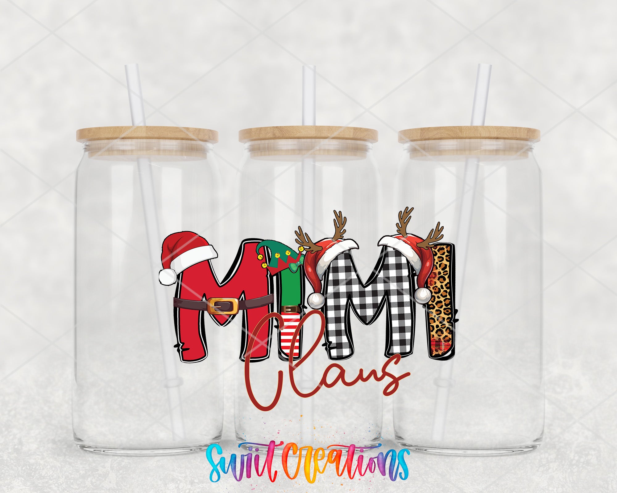 a couple of glass cups with christmas decorations on them