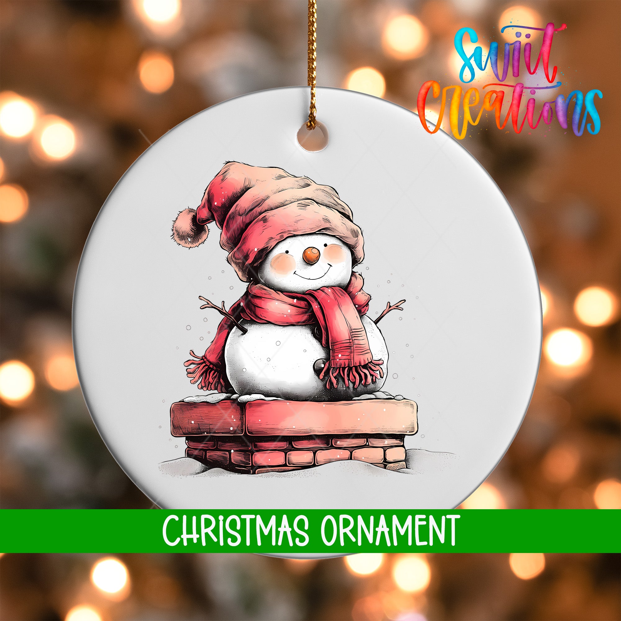 A white Christmas ornament featuring a snowman wearing a red scarf and hat, sitting on a brick chimney.