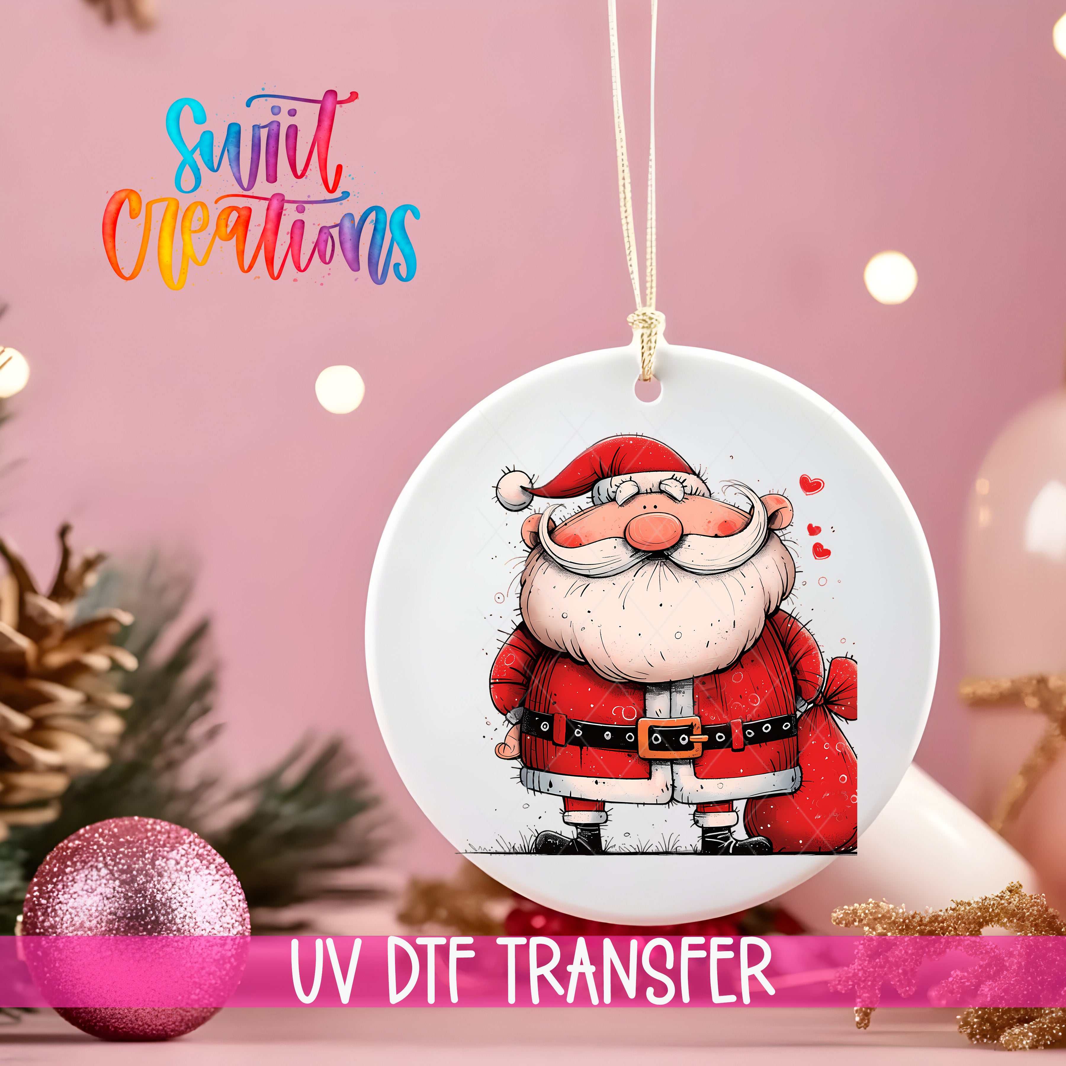 A white ceramic ornament featuring a cartoon Santa Claus figure is hanging on a string against a pink background.
