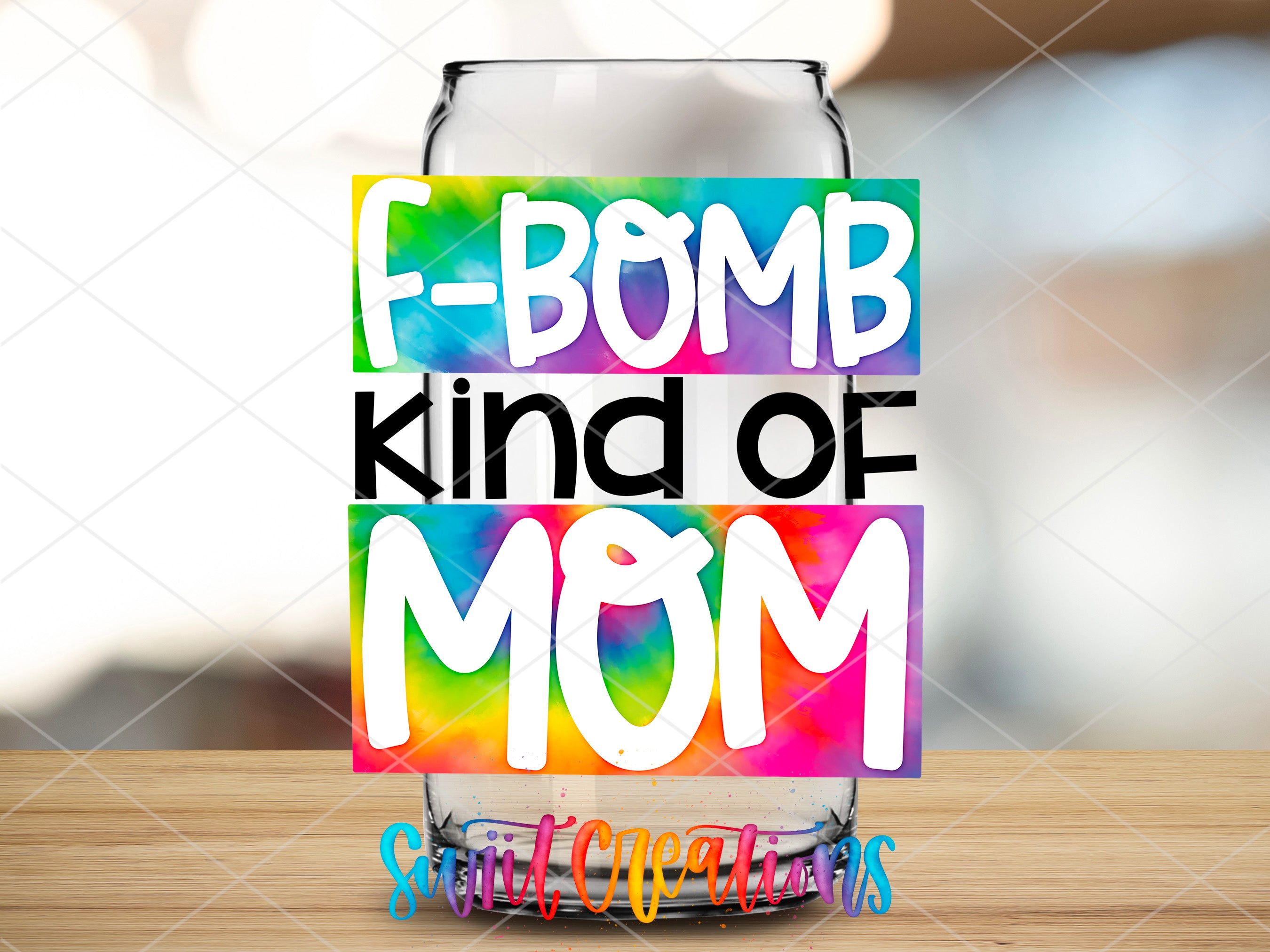 a beer glass with the words e - bomb kind of mom on it
