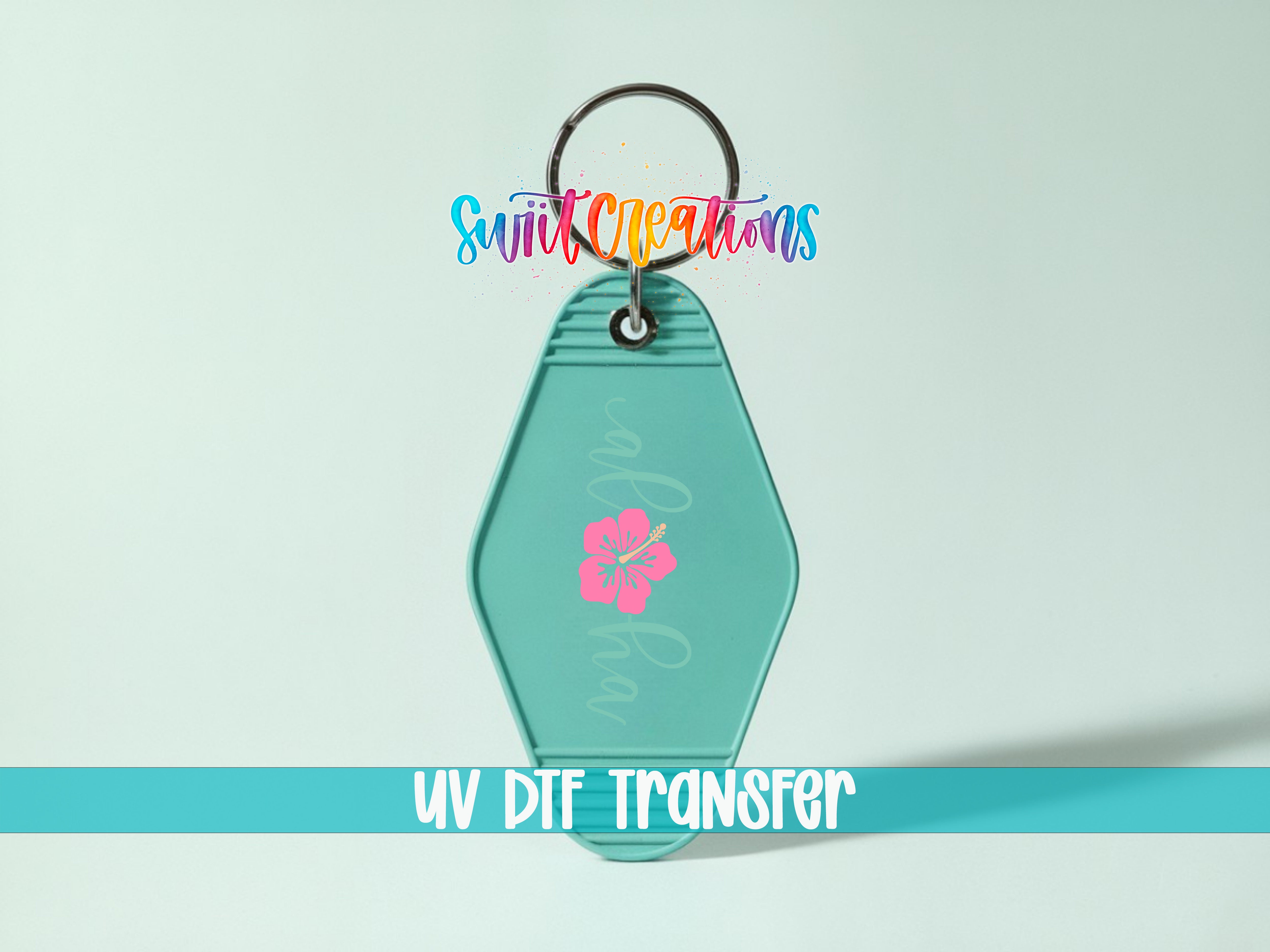 A keychain with a flower design and the text "UV DIF TRANSFER" printed on it.