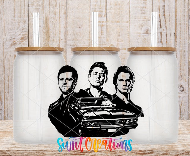 two mugs with the image of two men holding a car