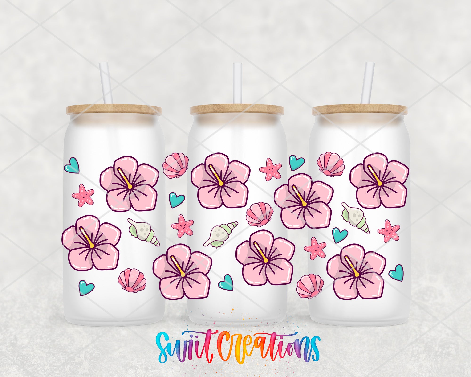 three frosted glass tumblers with a floral and starfish design, each with a straw.