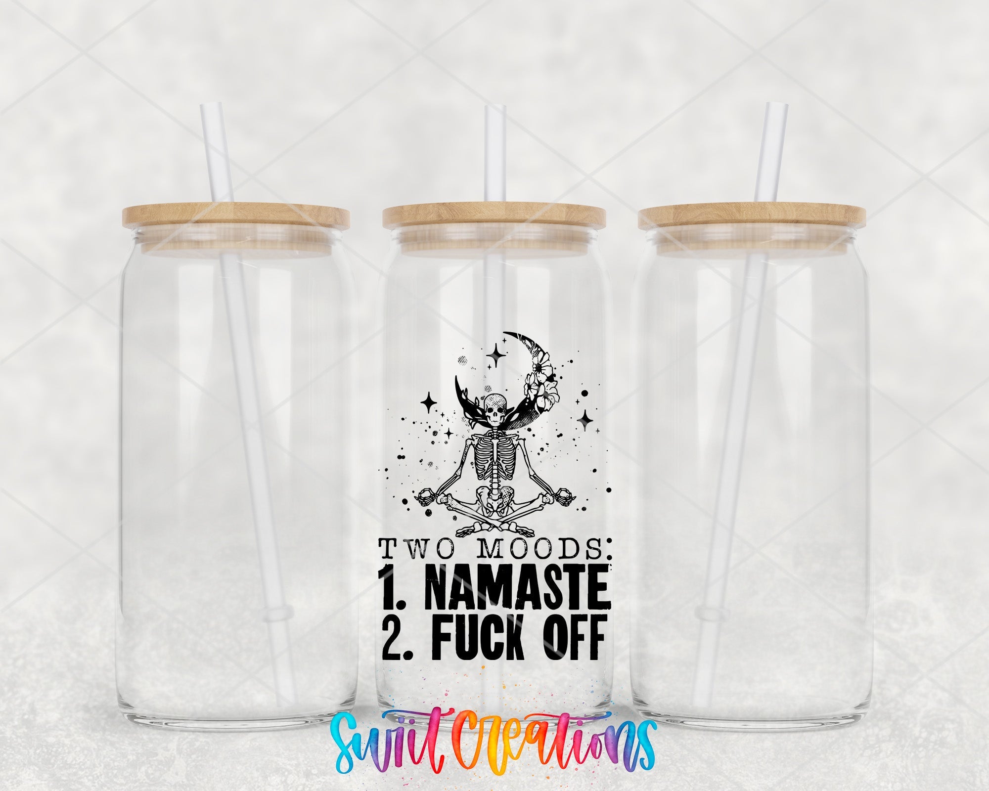 two mason jars with lids and straws on a white background