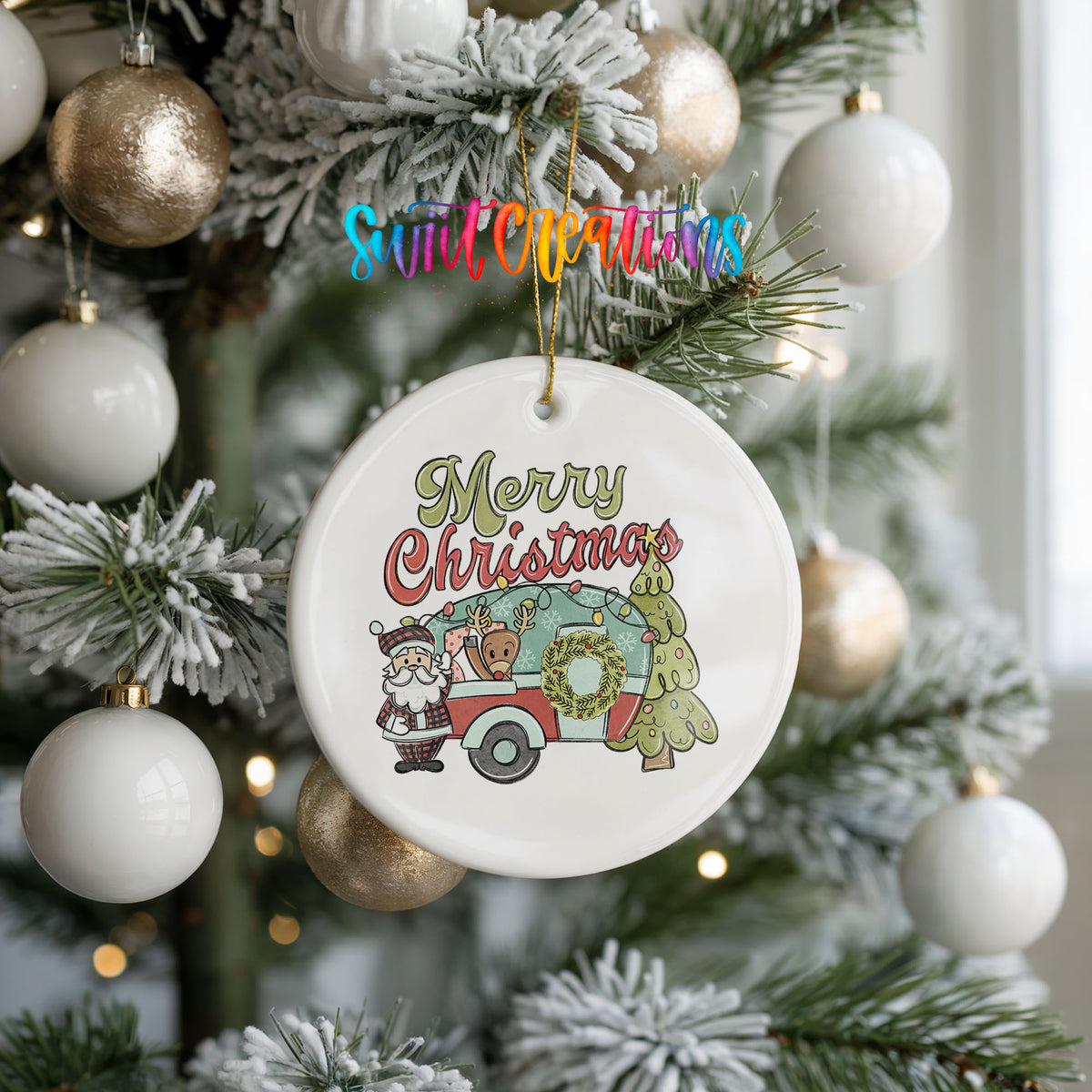 Merry Christmas Santa Camper ceramic Christmas ornament hanging on a frosted holiday tree