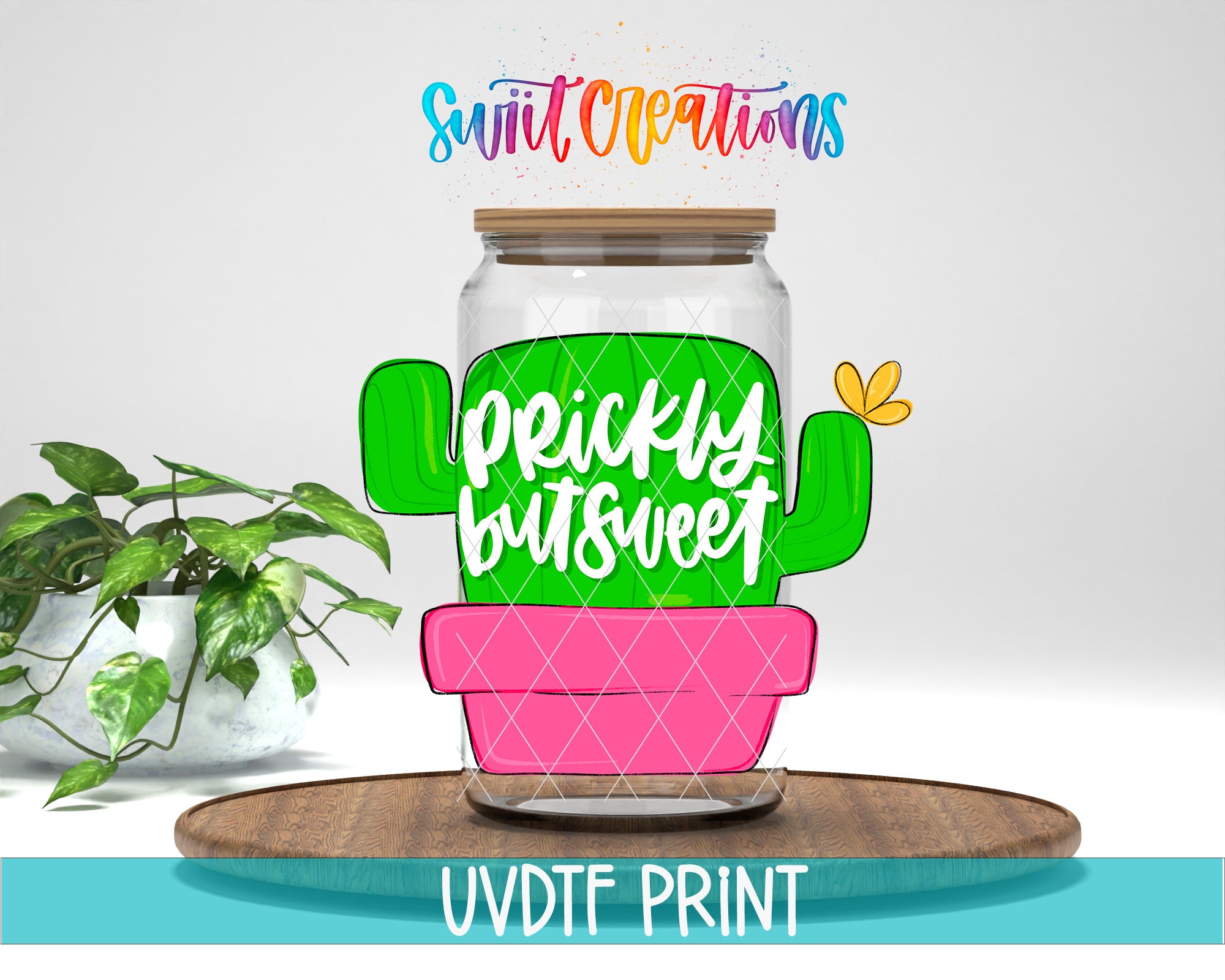 a glass jar with a cactus on top of it