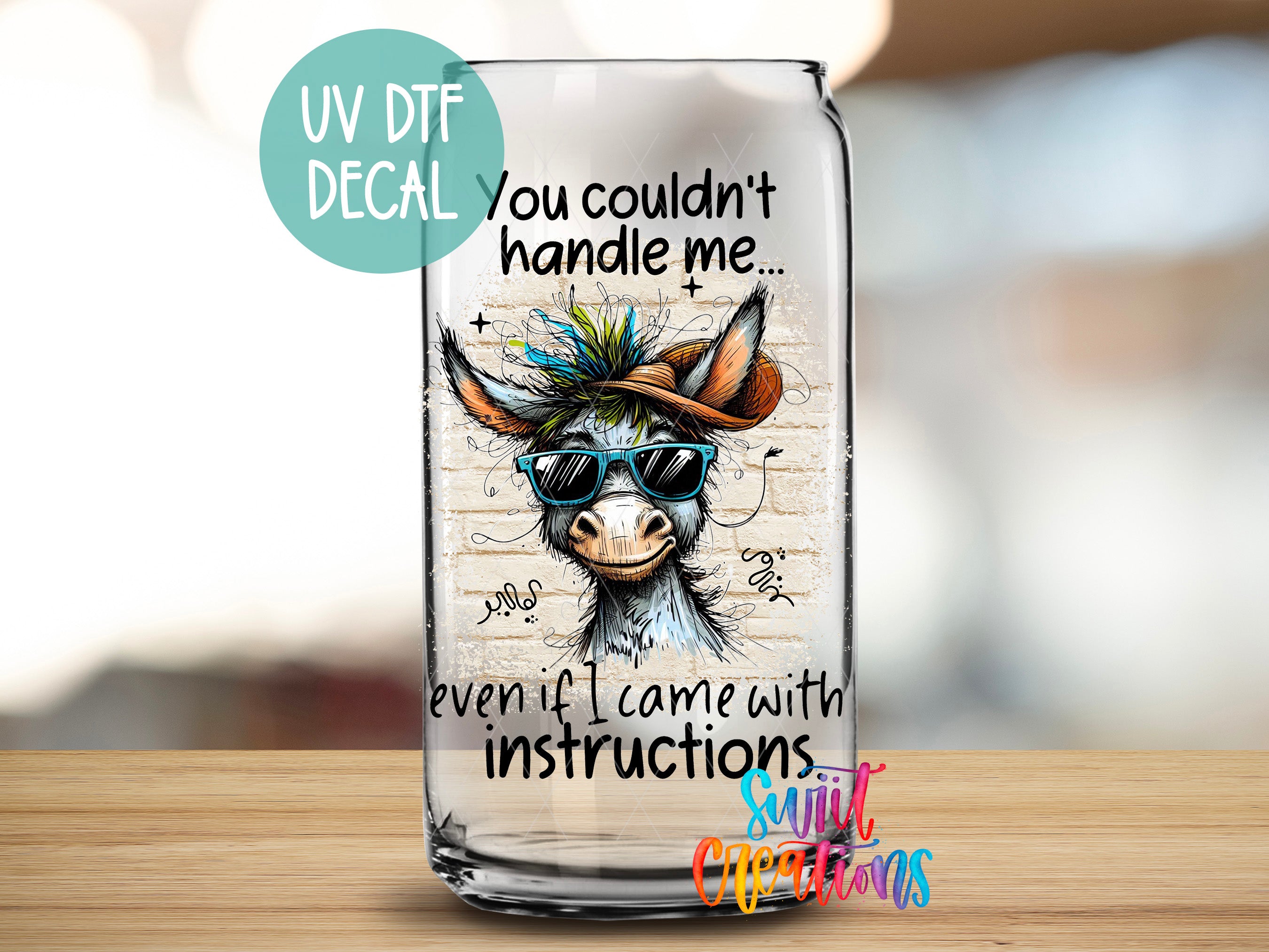 a glass with a cow wearing sunglasses on it