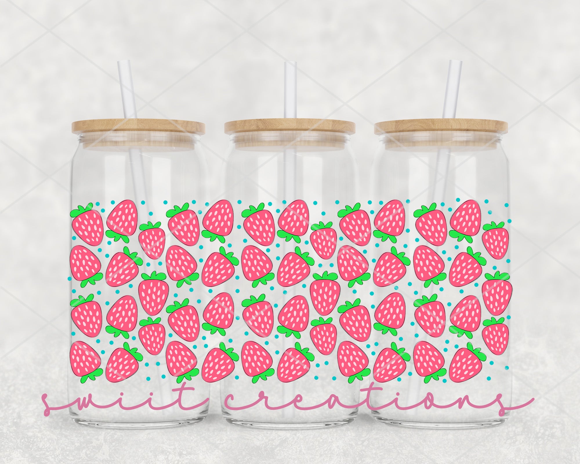 a set of three mason jars with strawberries on them