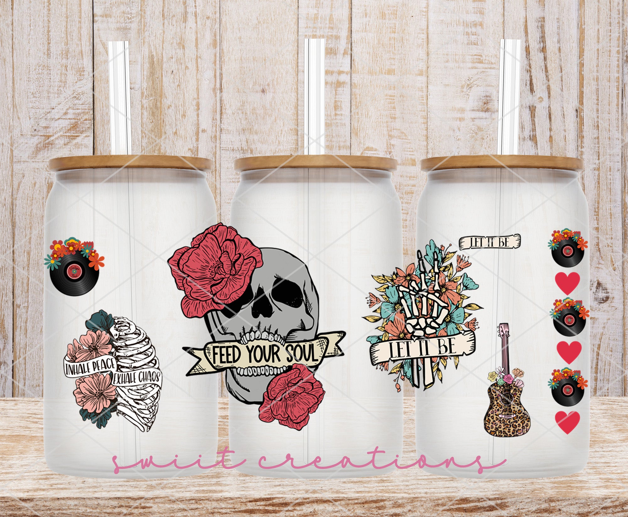 a couple of cups with some stickers on them