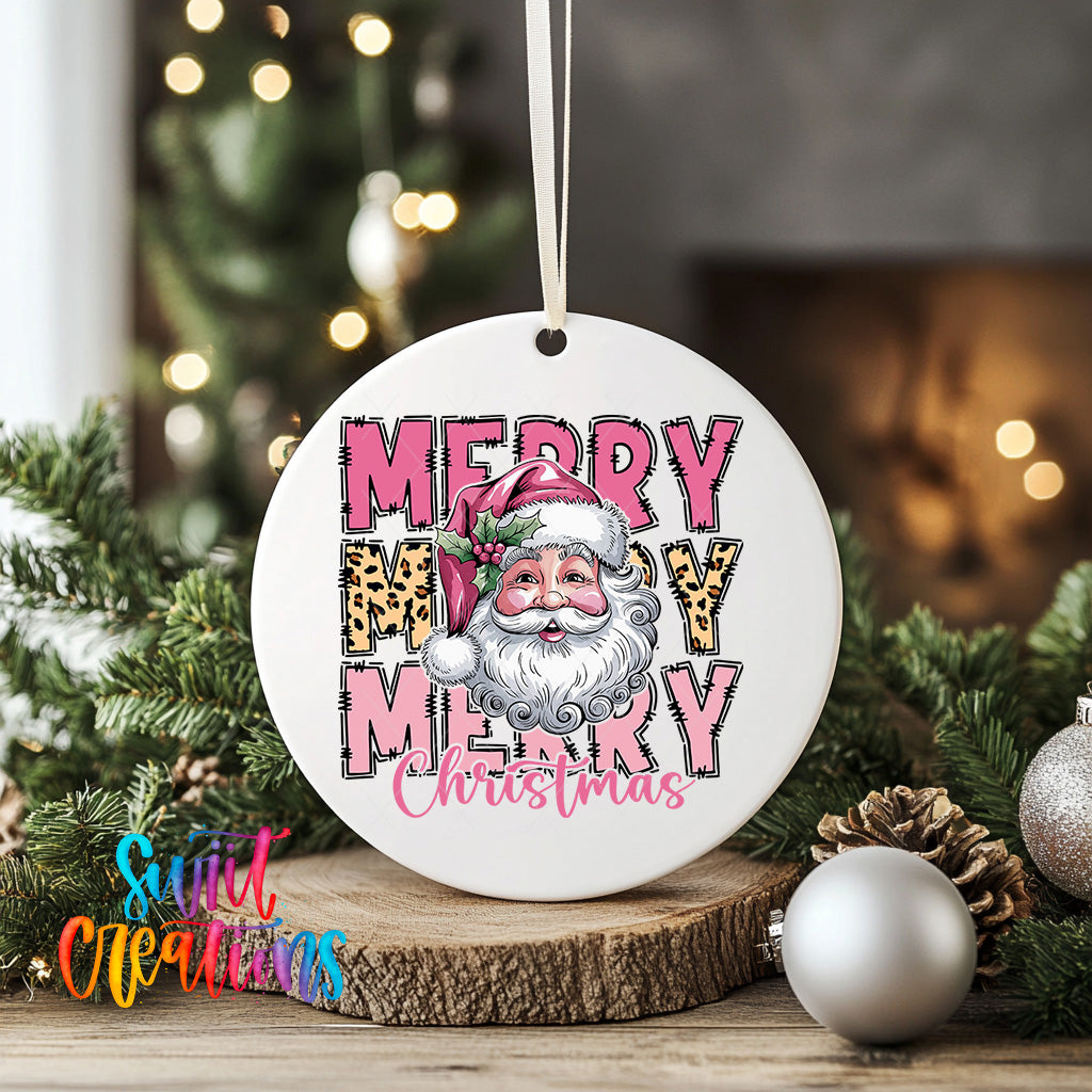A white Christmas ornament with a Santa Claus face and the text "MERRY MARY CHRISTMAS" displayed on it, hanging on a string.