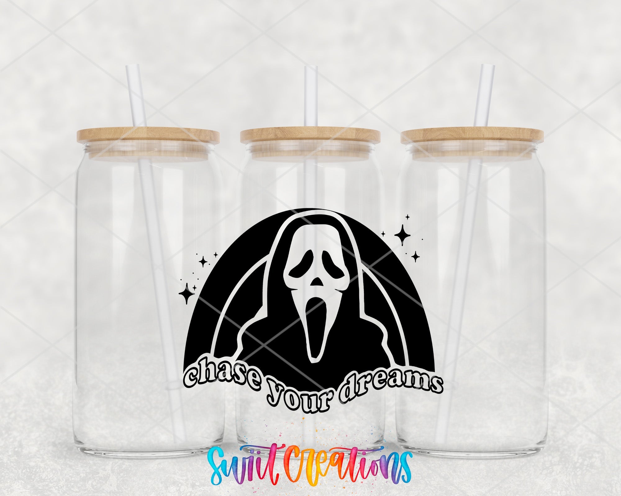 a couple of glasses with a ghost on them