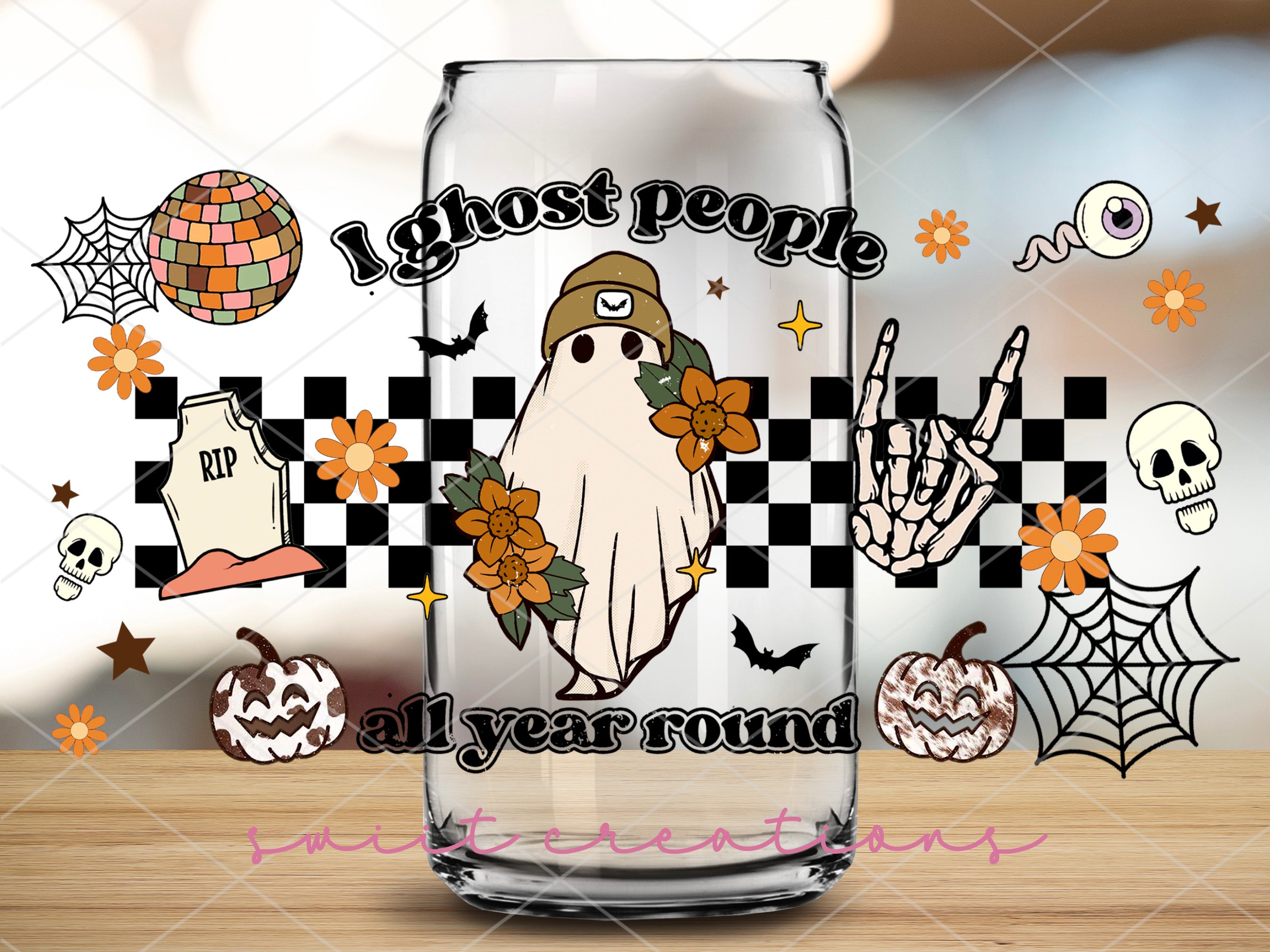 a glass with a picture of a ghost on it