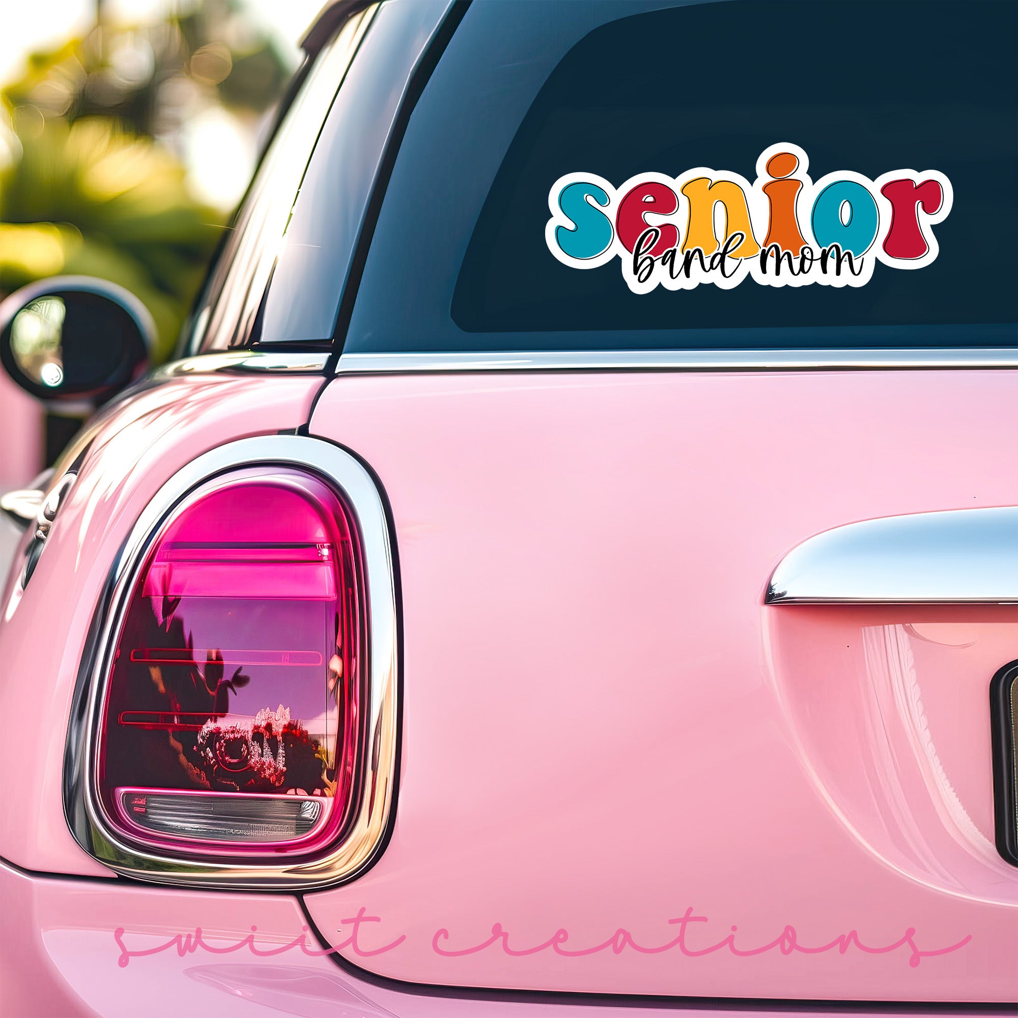 a pink car with the word senior on it
