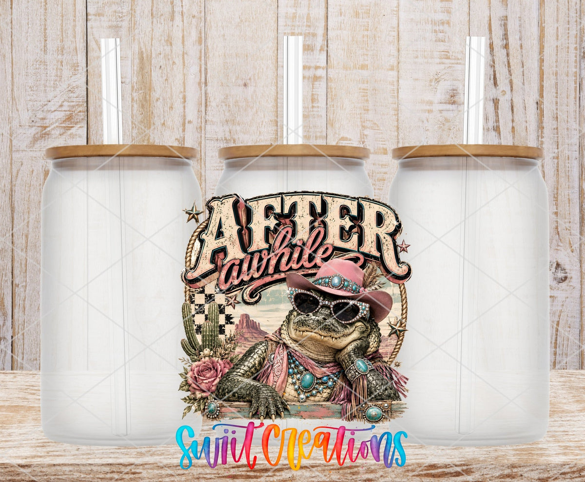 After Awhile Crocodile Western Glam UV DTF transfer applied to a clear glass can set from Swiit Creations
