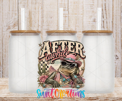 After Awhile Crocodile Western Glam UV DTF transfer applied to a clear glass can set from Swiit Creations