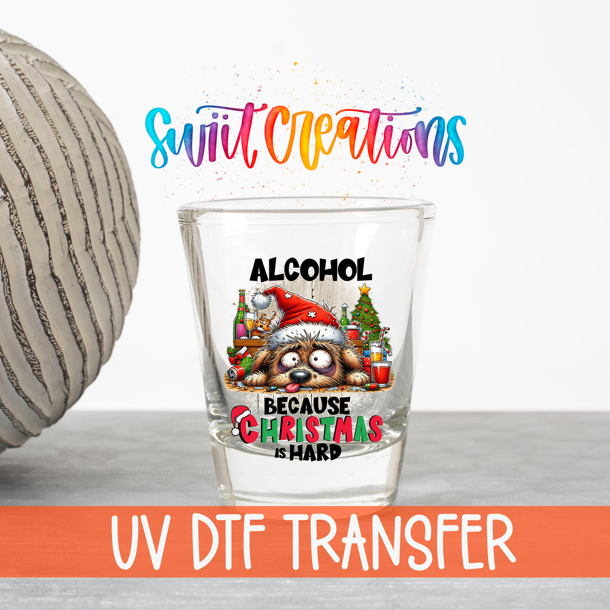 Alcohol Because Christmas is Hard UV DTF transfer on a clear shot glass with the Swiit Creations logo and UV DTF Transfer banner