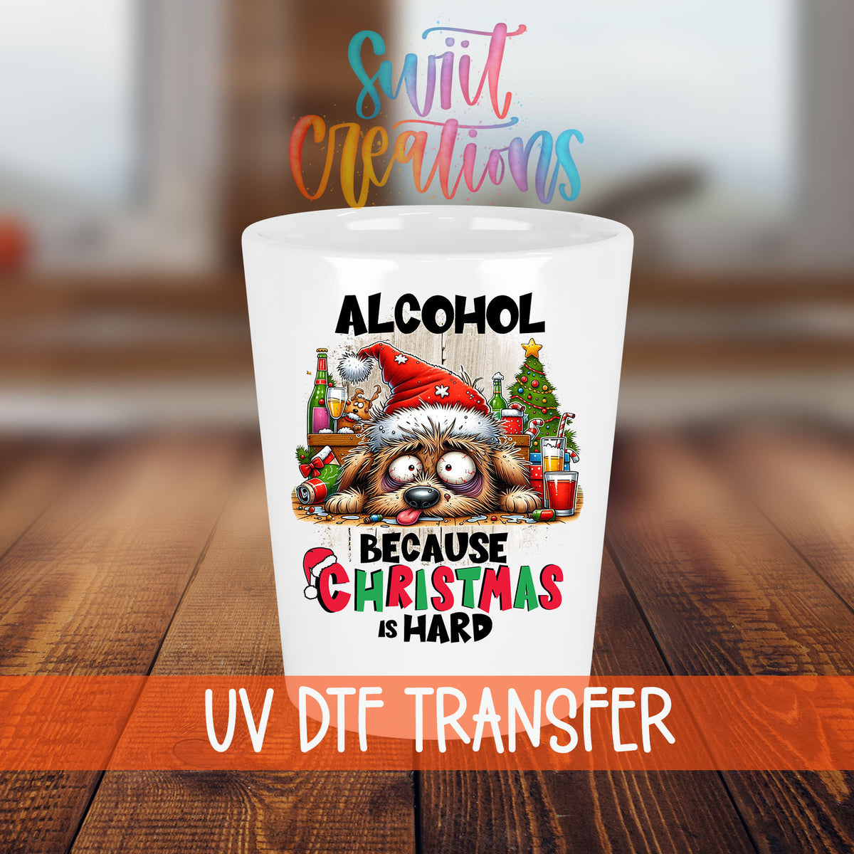 Alcohol Because Christmas is Hard shot glass transfer on a white shot glass on a wooden table