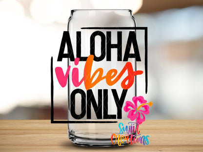 Close-up of the Aloha Vibes Only UV DTF transfer on a clear glass can
