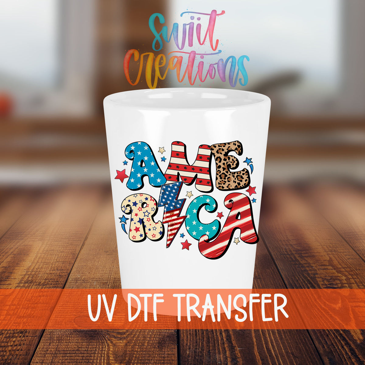 America shot glass transfer on a white shot glass on a wooden table