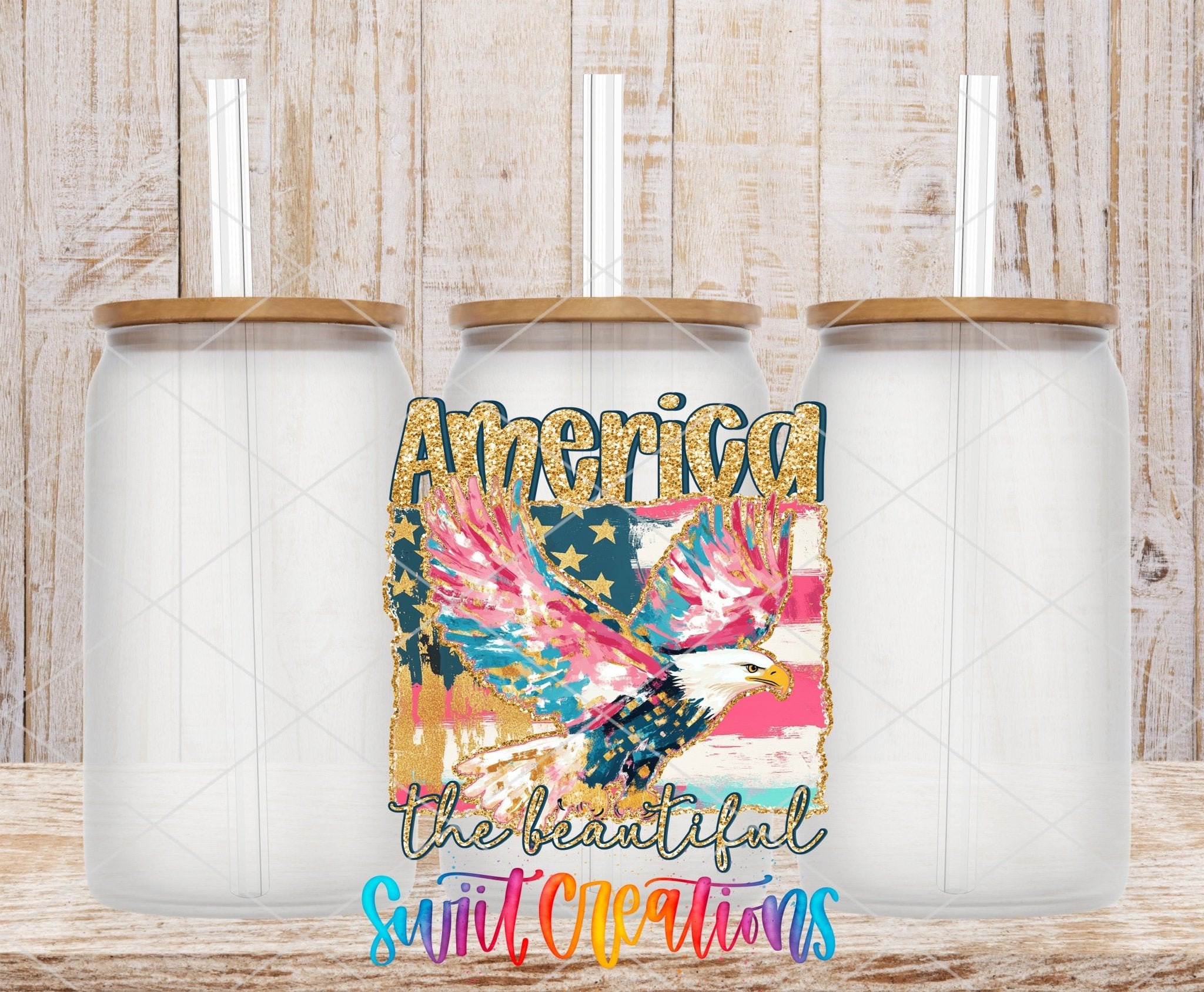 America The Beautiful Eagle Patriotic UV DTF transfer applied to a clear glass can set from Swiit Creations