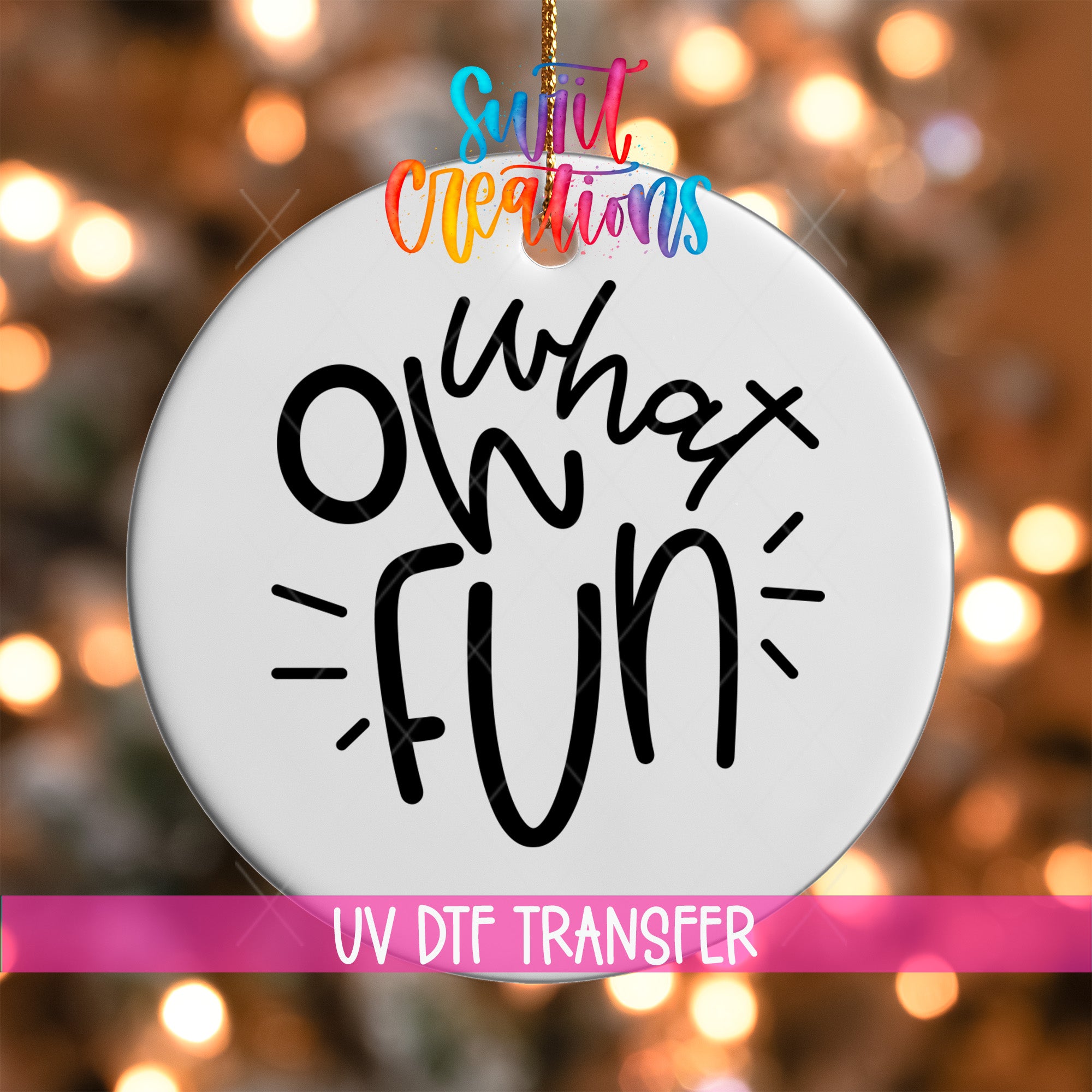 A white circular ornament with the text "What's fun" written on it, hanging against a background of colorful lights.