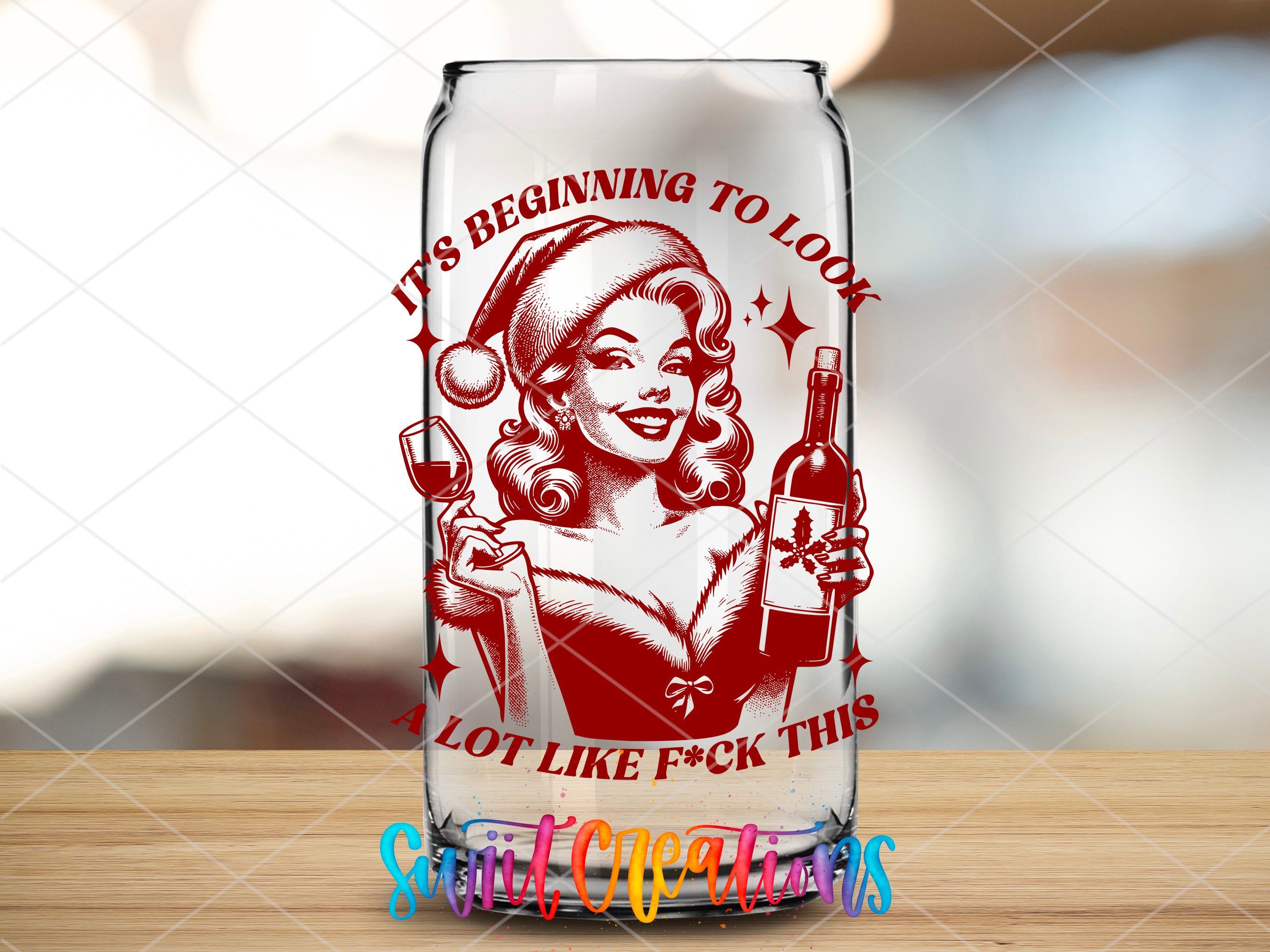 a glass with a picture of a woman holding a bottle