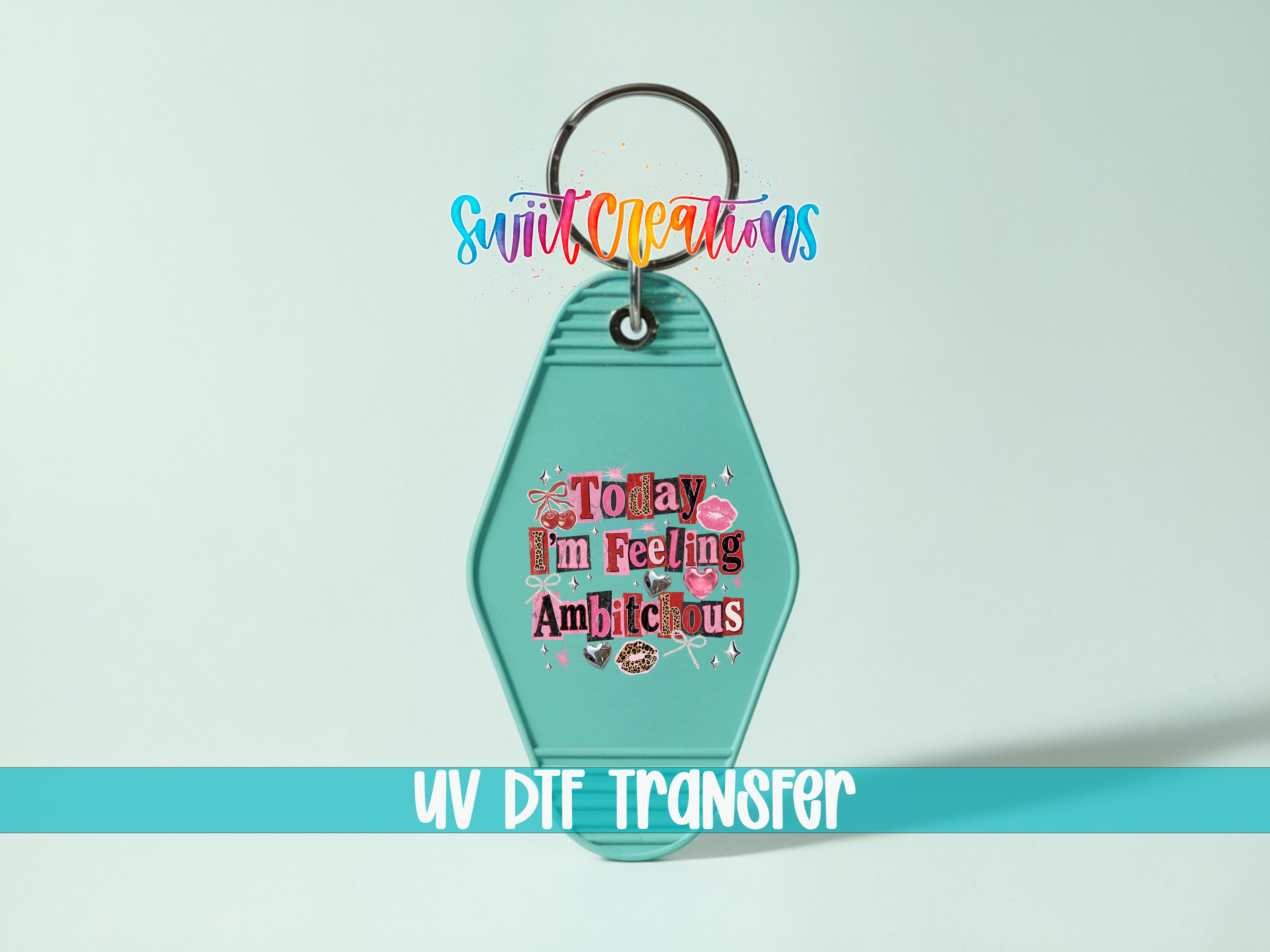 A keychain with a colorful design and text on it, placed against a light blue background.