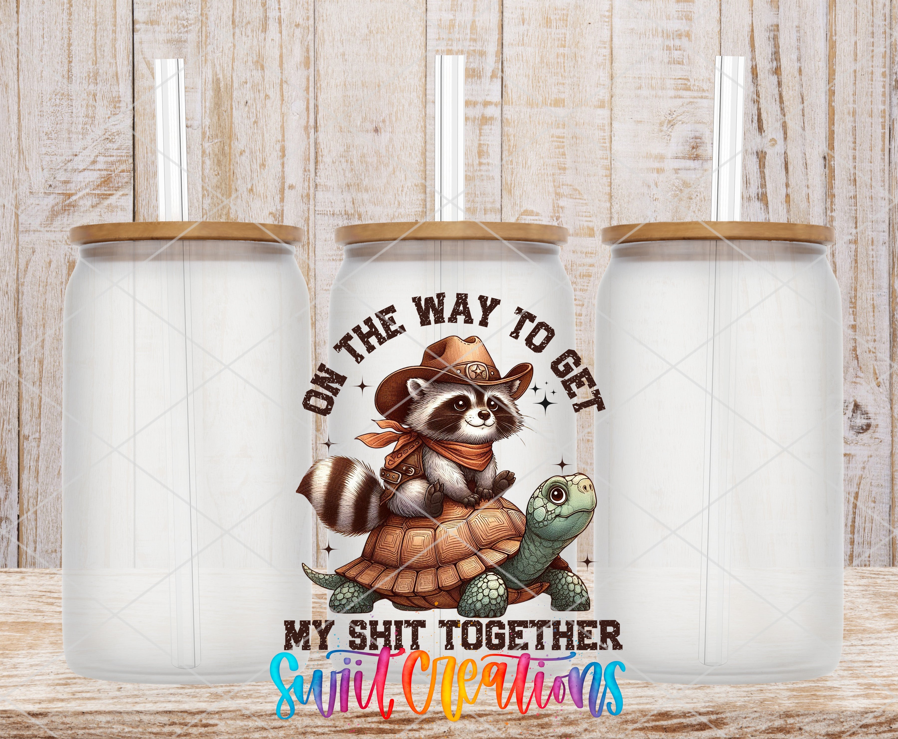 a couple of white cups with a raccoon on them