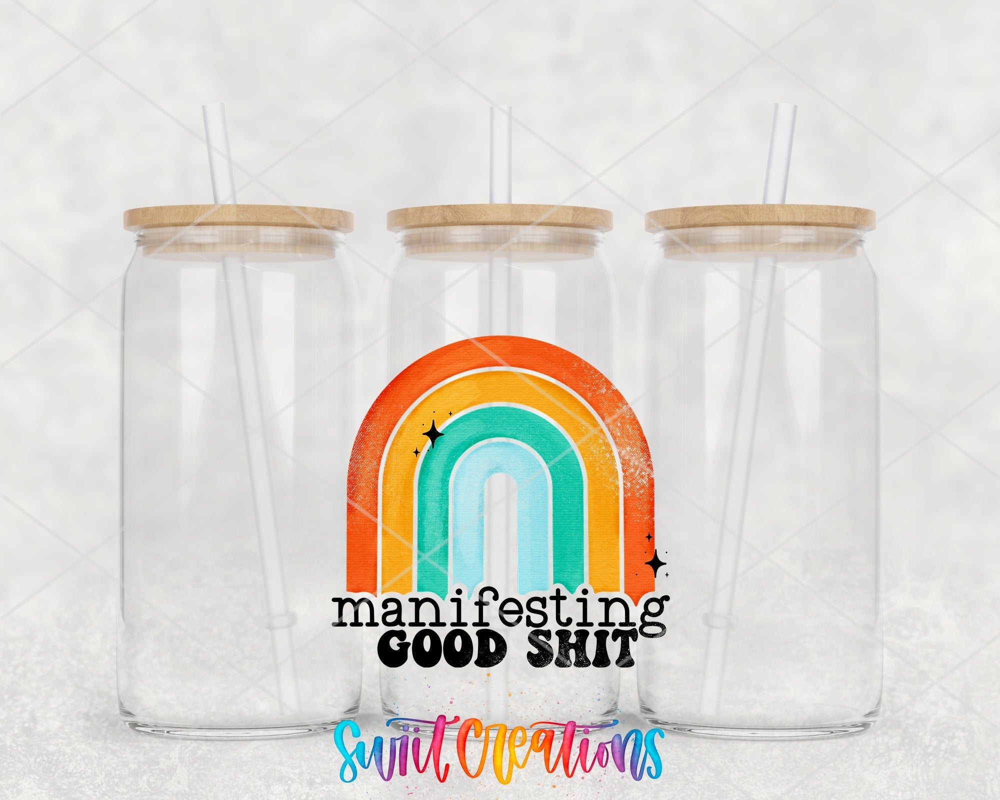 two clear tumblers with a rainbow on the side