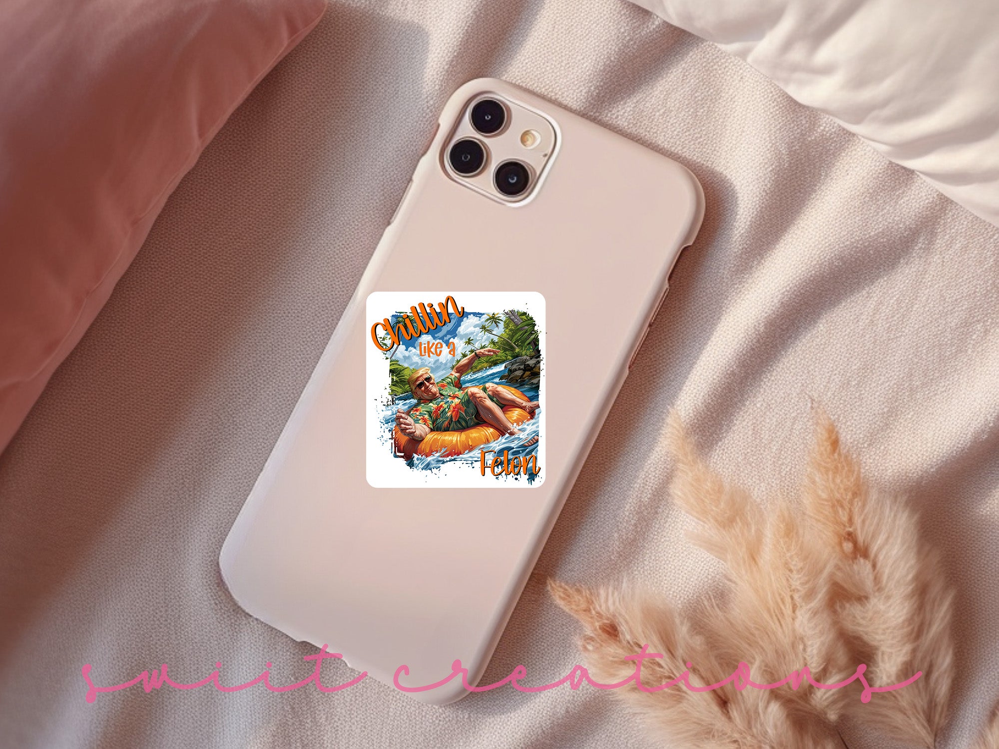 a phone case sitting on top of a bed