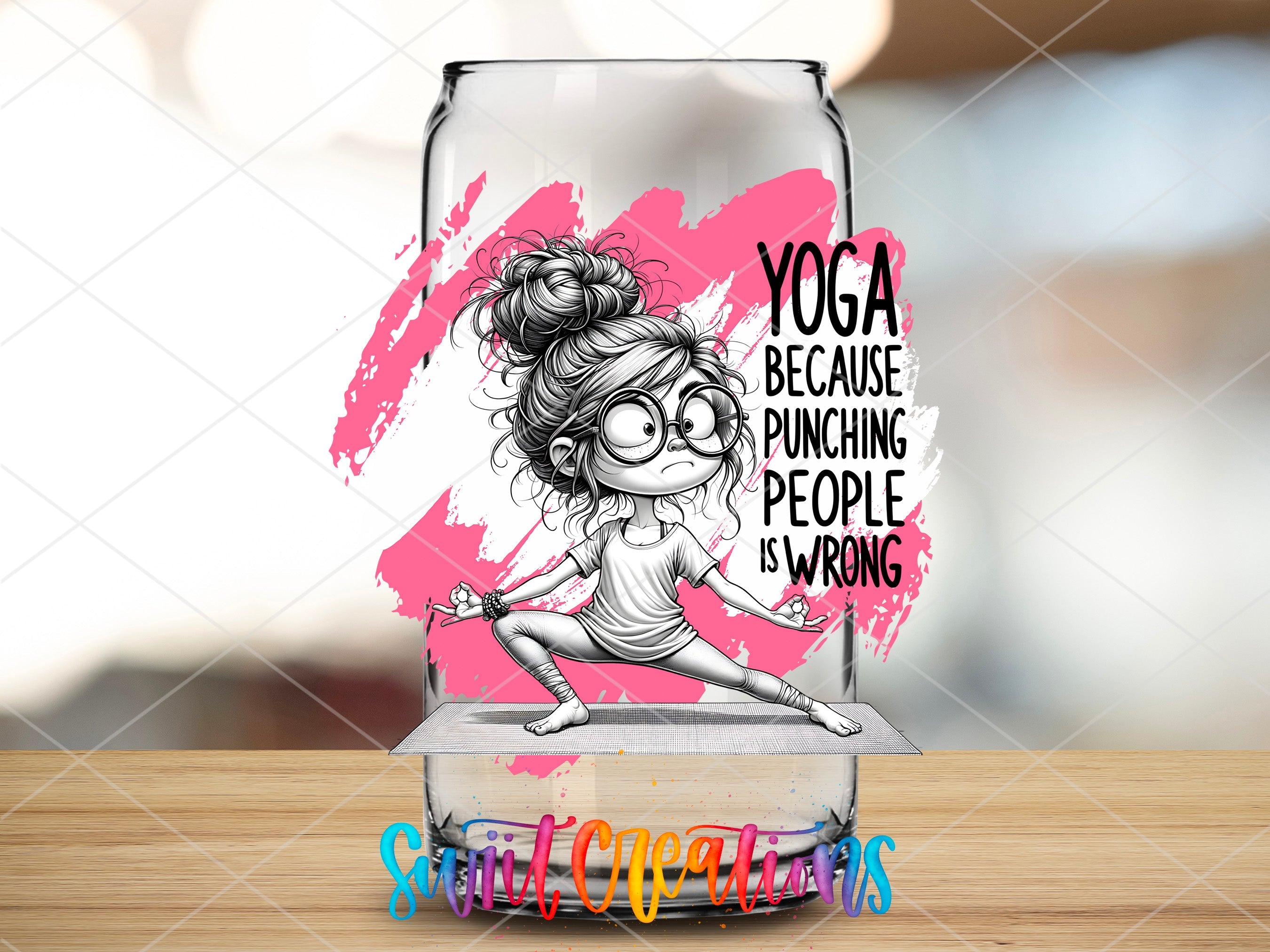 a glass with a picture of a woman doing yoga