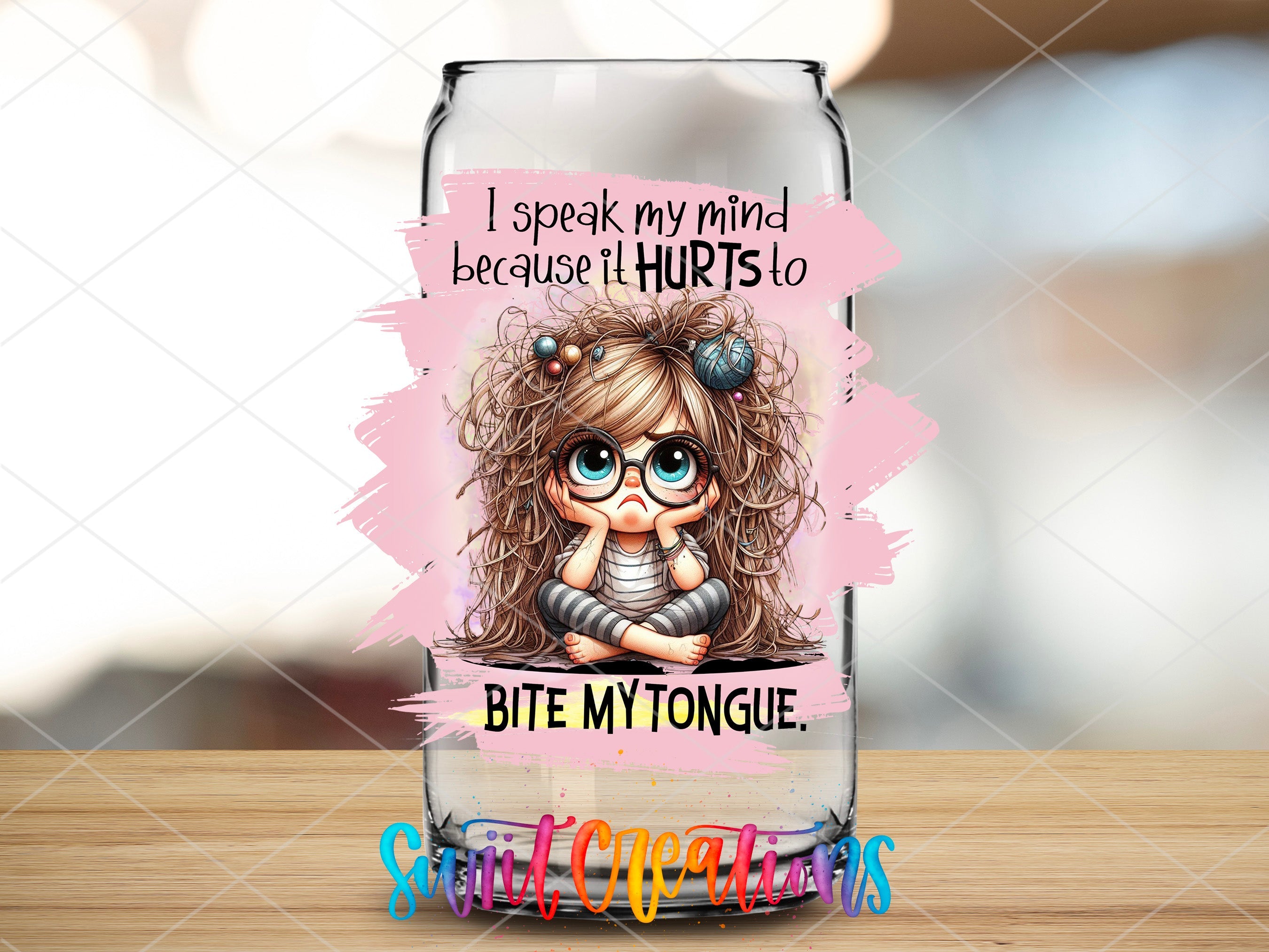 a glass with a picture of a girl on it