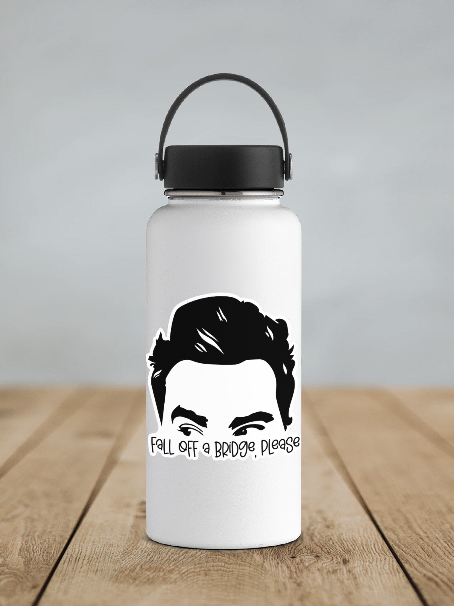 a water bottle with a picture of a man's face on it