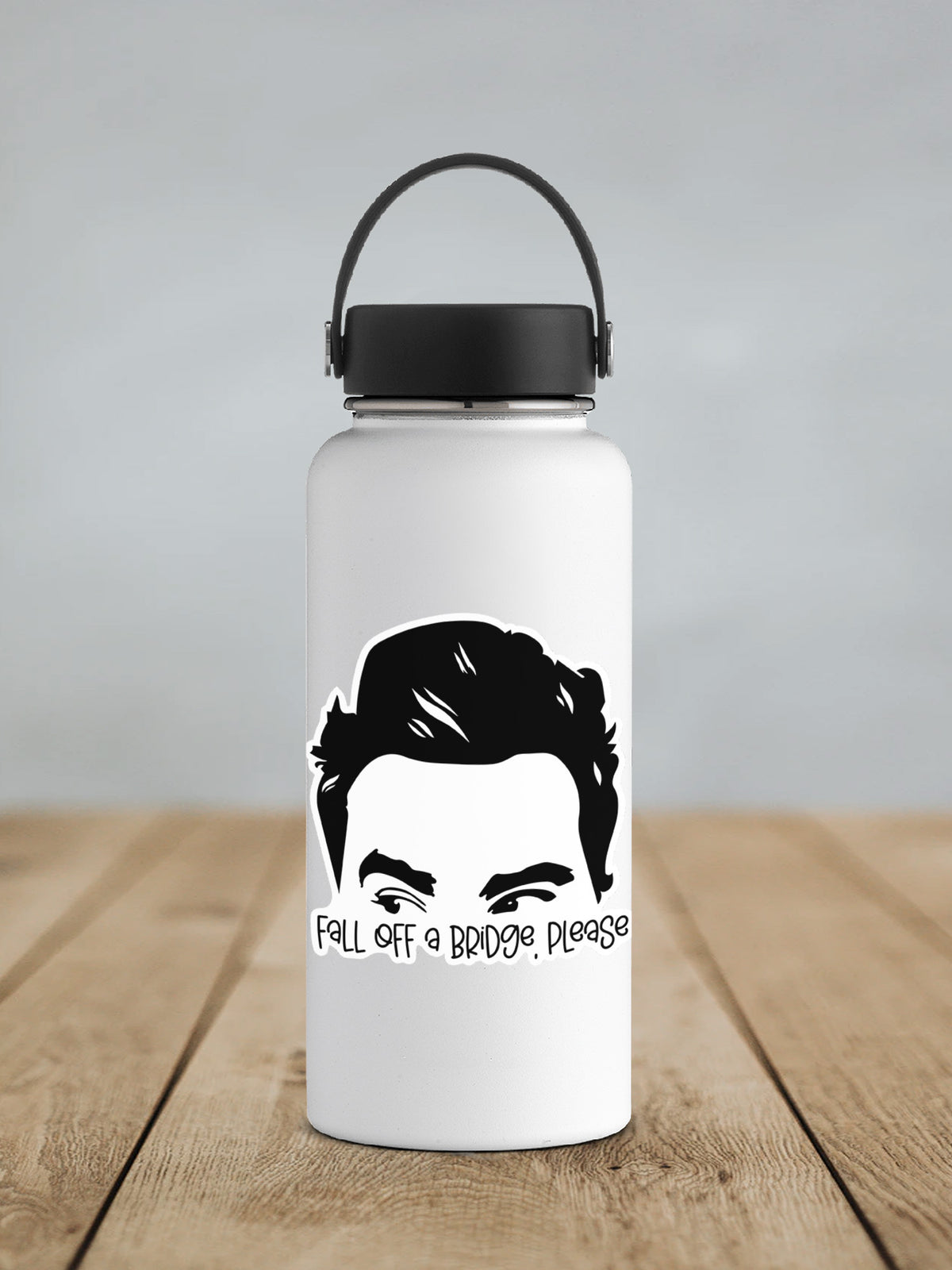 a water bottle with a picture of a man's face on it