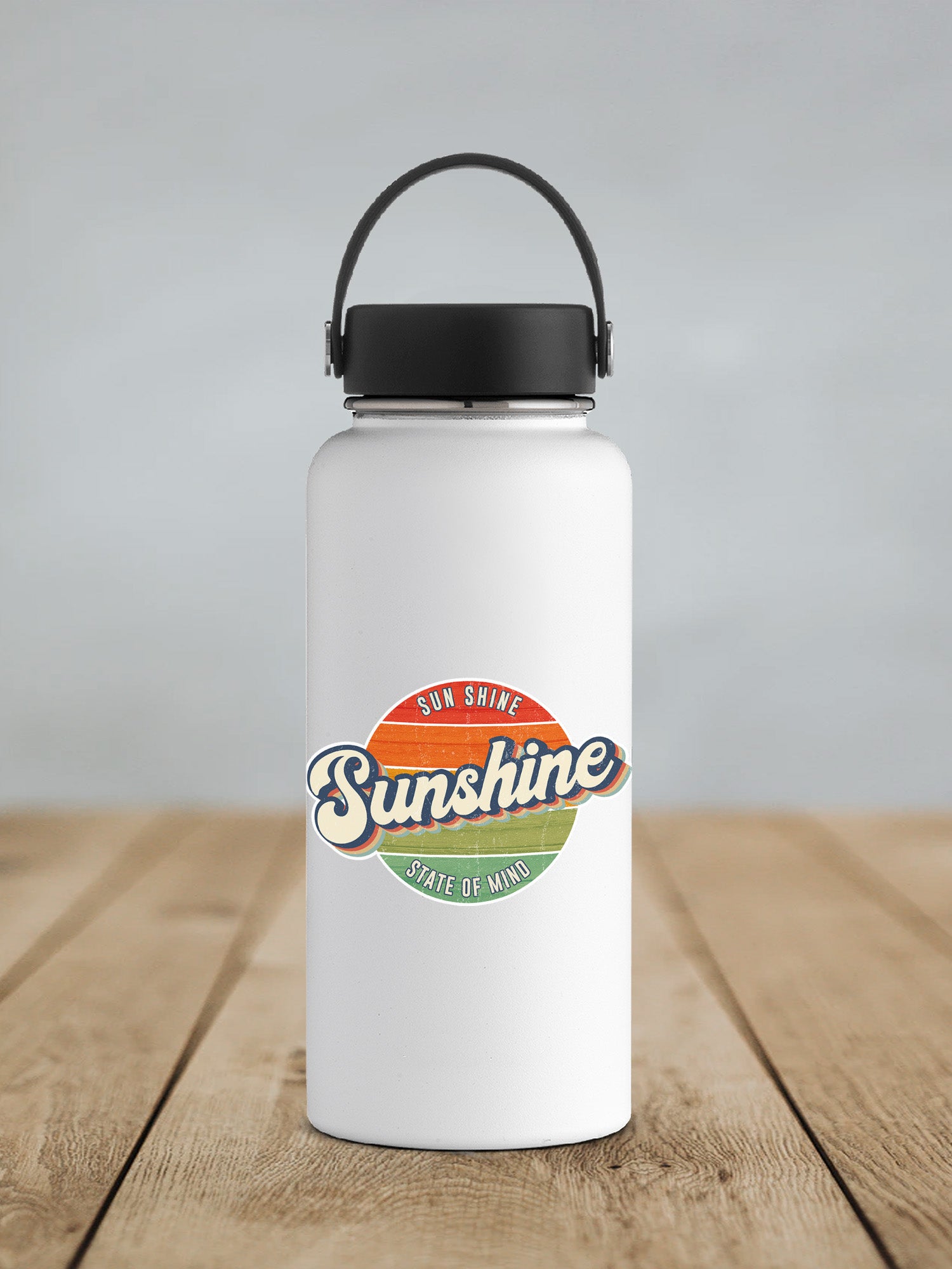 a white water bottle sitting on top of a wooden table