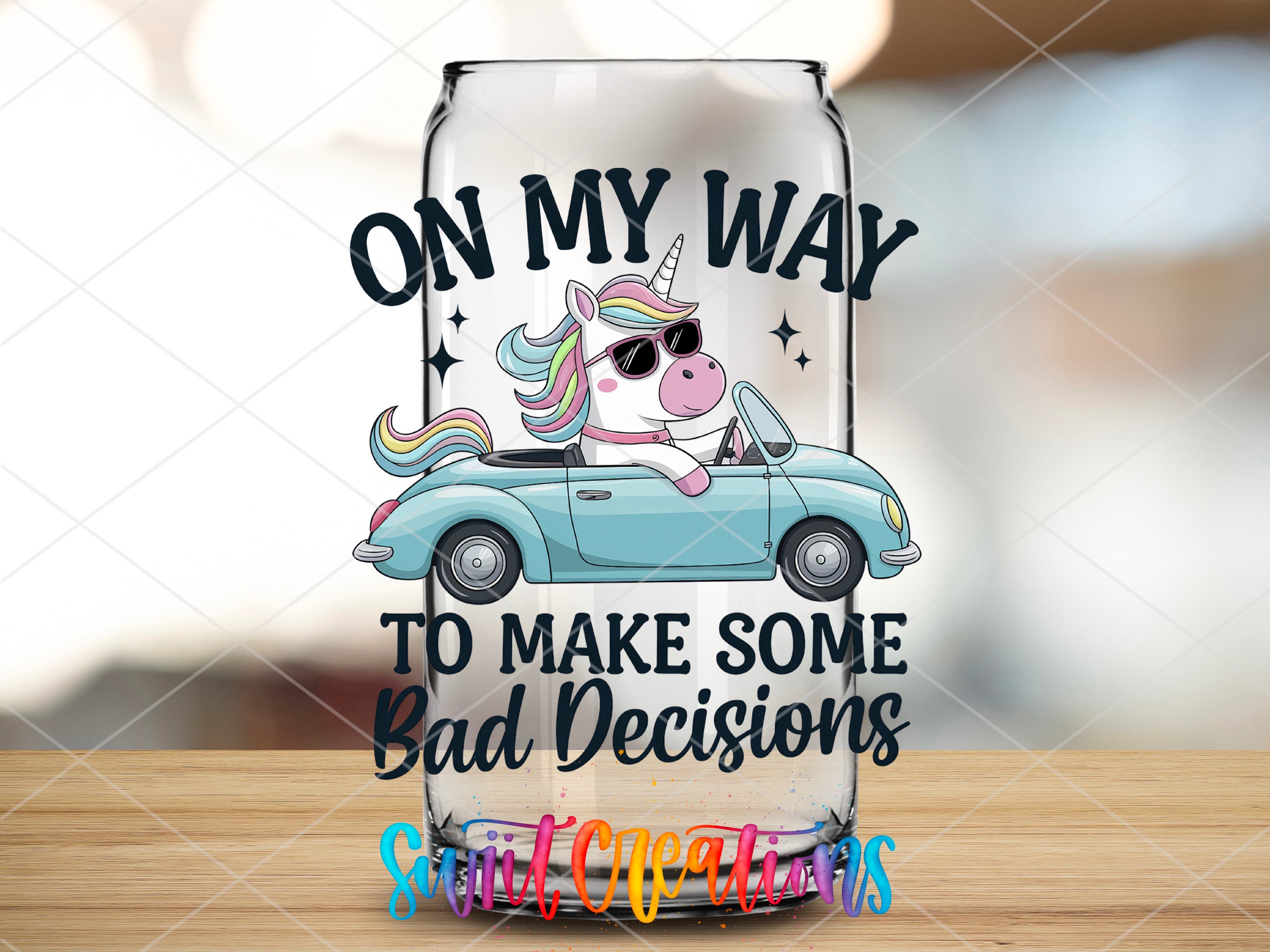 a glass with a unicorn driving a car on it