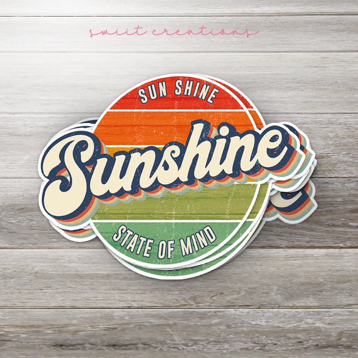 Stack of Sunshine State of Mind glossy stickers on a gray wood table